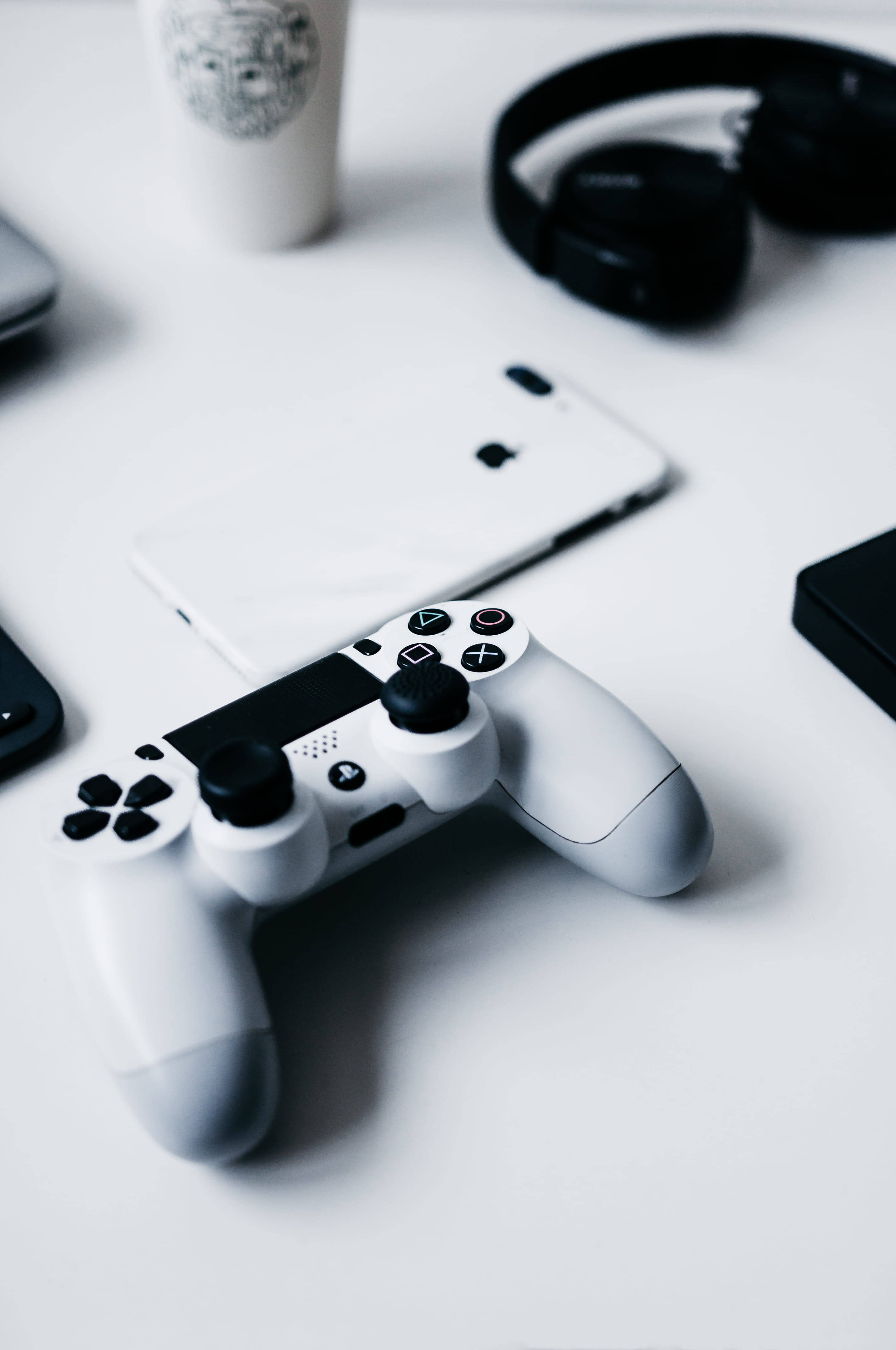 iPhone-buro met PlayStation-beheerder Muurpapier