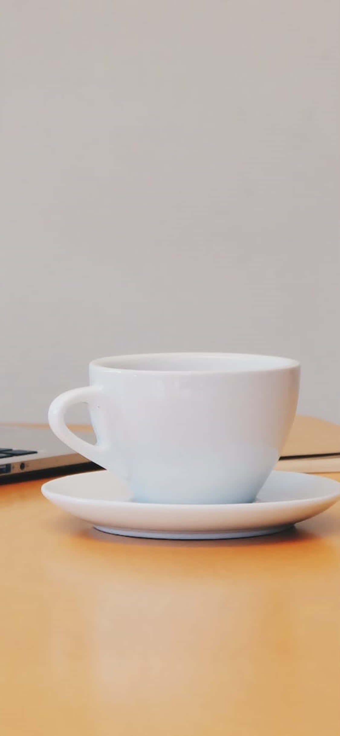 iPhone X Lessenaaragtergrond Wit Koffiebeker Muurpapier