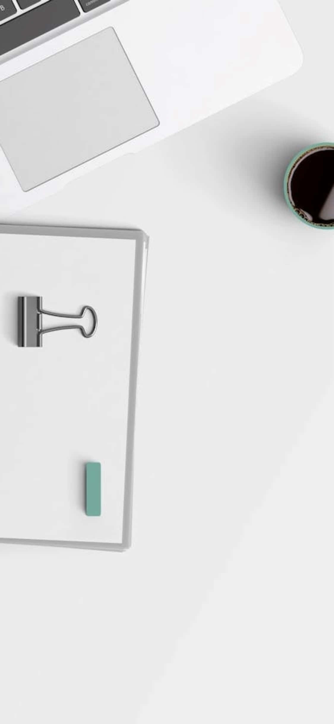iPhone X Lessenaaragtergrond Klembord en 'n Skootrekenaar Muurpapier