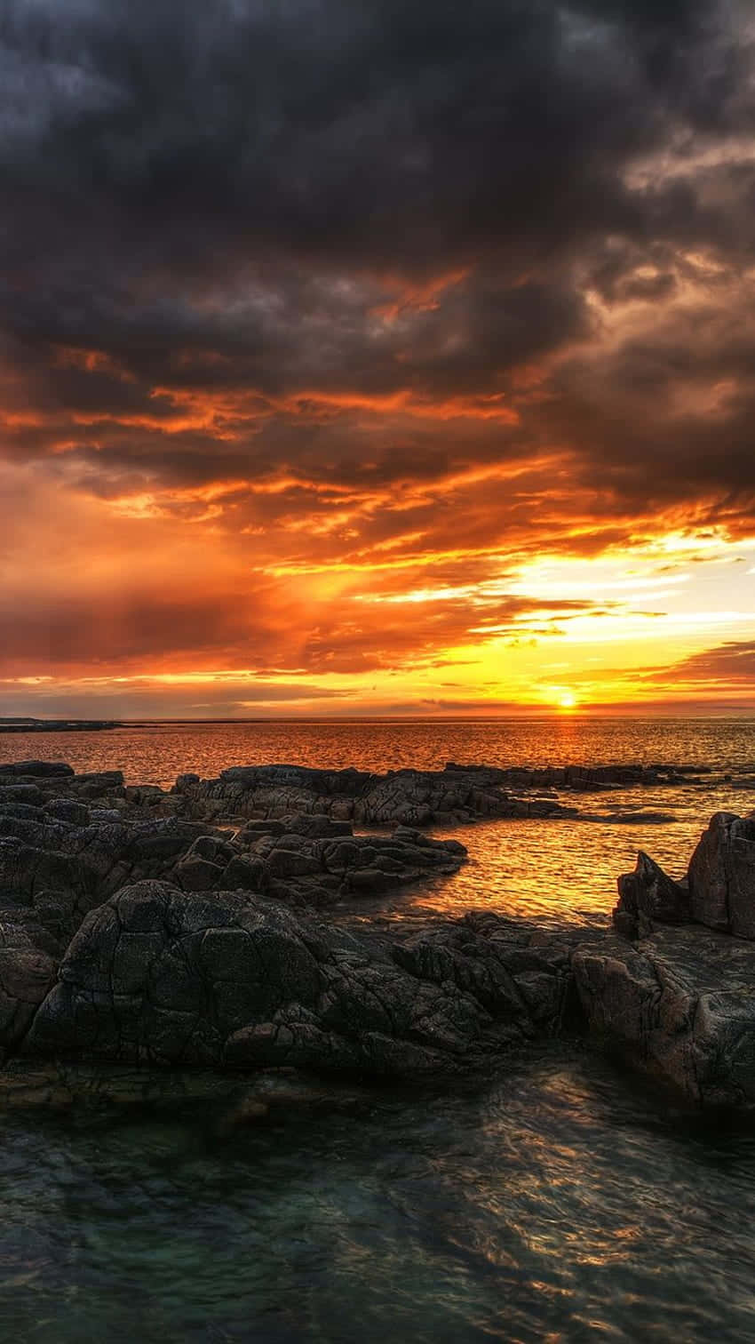 iPhone X Malibu Agtergrond Stormagtige Sonsondergang Lug Muurpapier