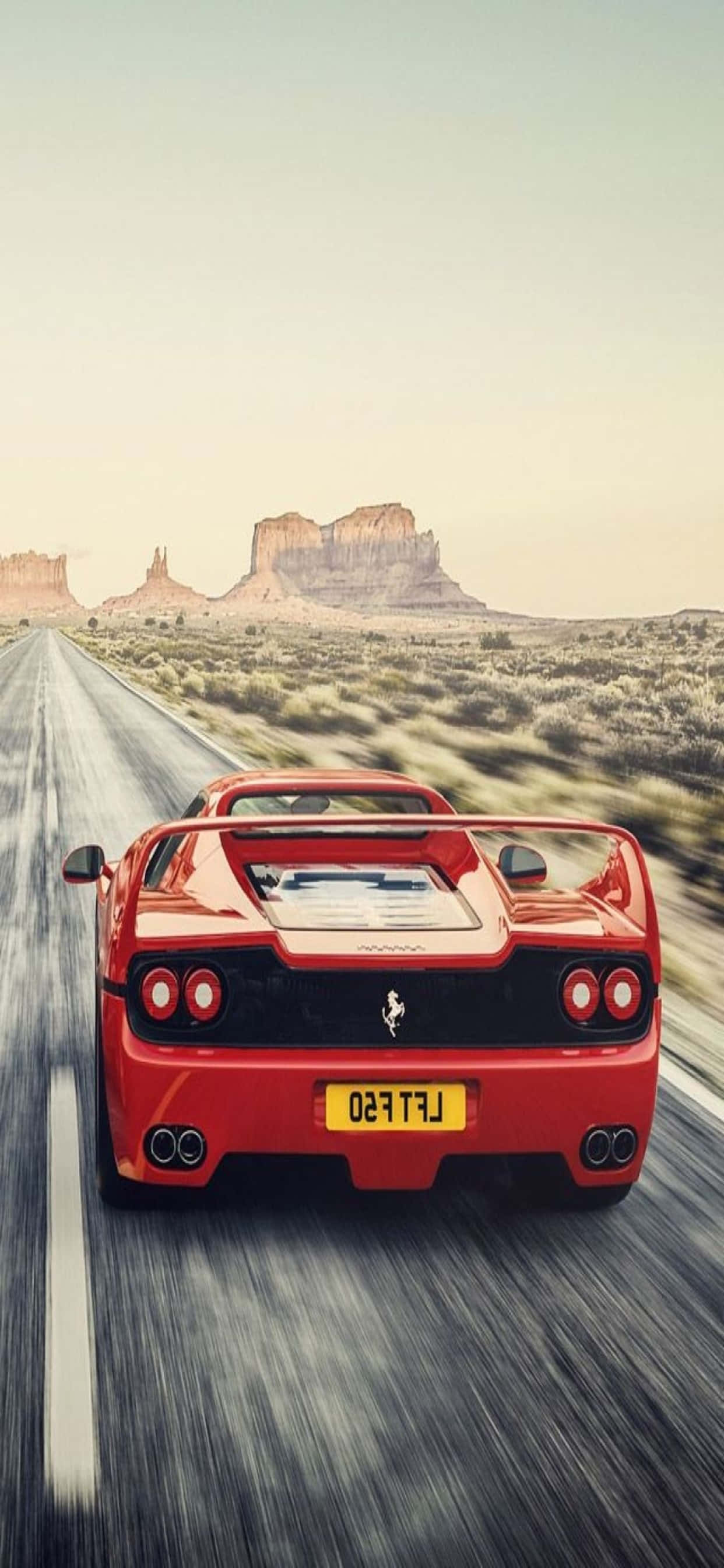 iPhone Xs Max Ferrari Agtergrond Rooi Ferrari F50 Op Die Pad Muurpapier