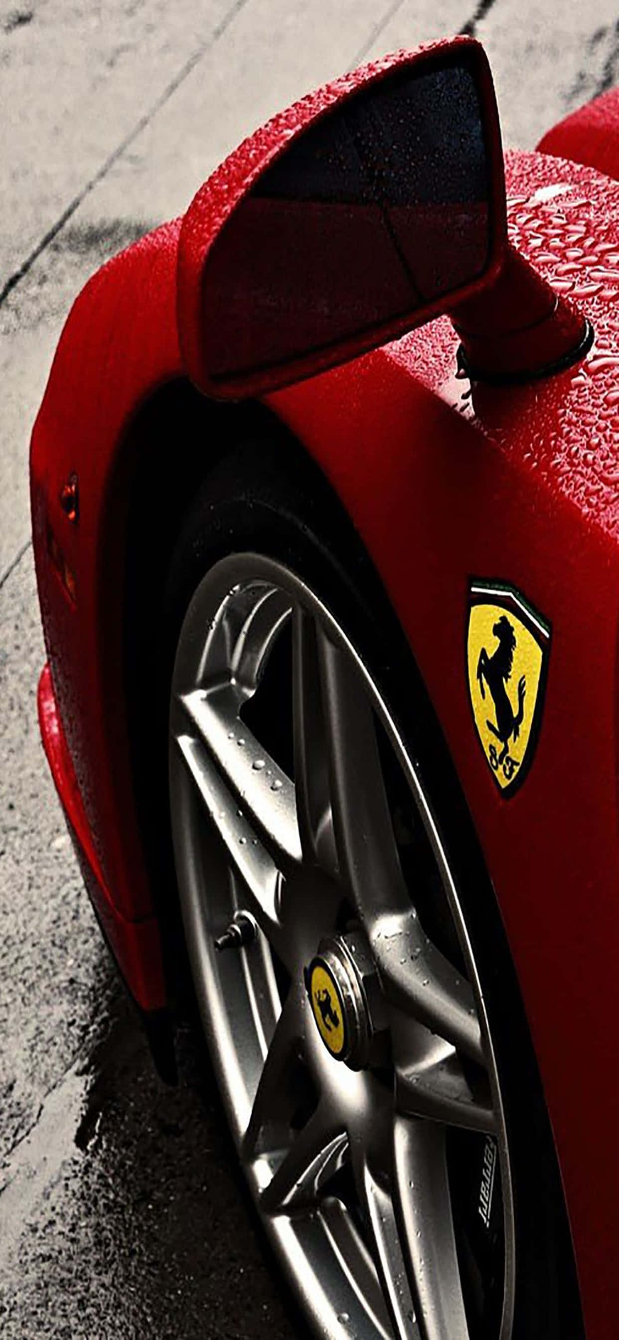 iPhone Xs Max Ferrari-agtergrond Syprofiel van 'n Rooi Ferrari Enzo Muurpapier