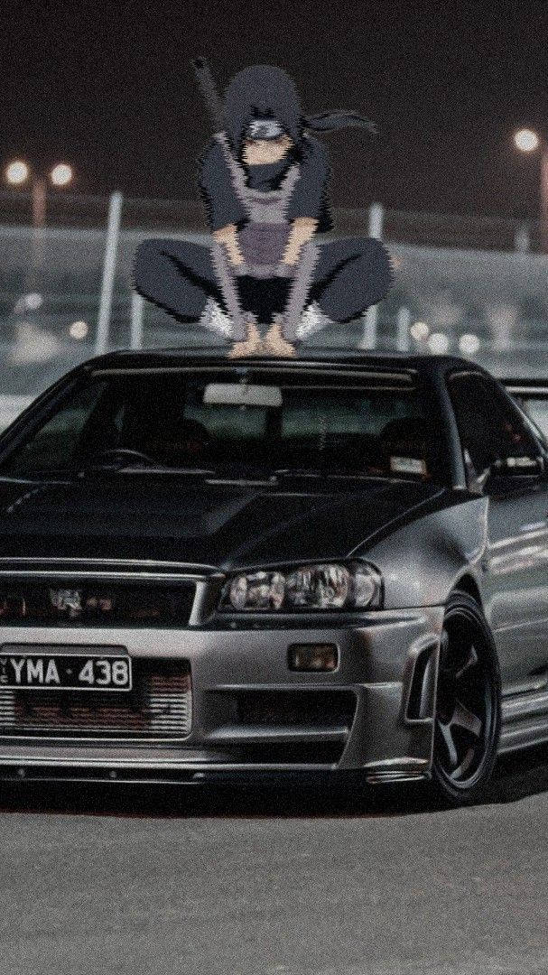 Itachi wat Op 'n Motor Hurk Anime Muurpapier
