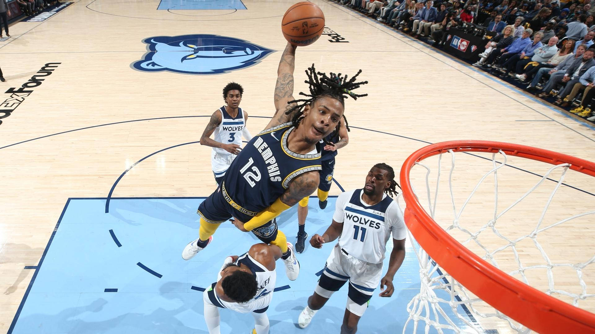 Ja Morant-slamdunk teen Wolves Muurpapier