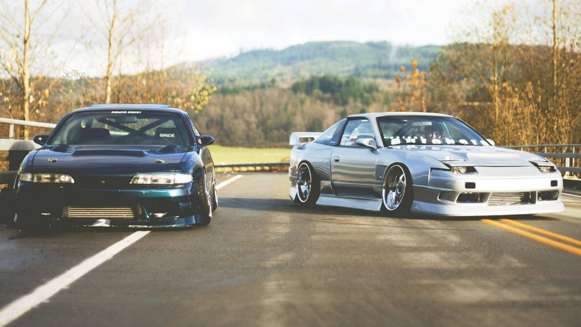 JDM Motors wat op pad geparkeer is Muurpapier