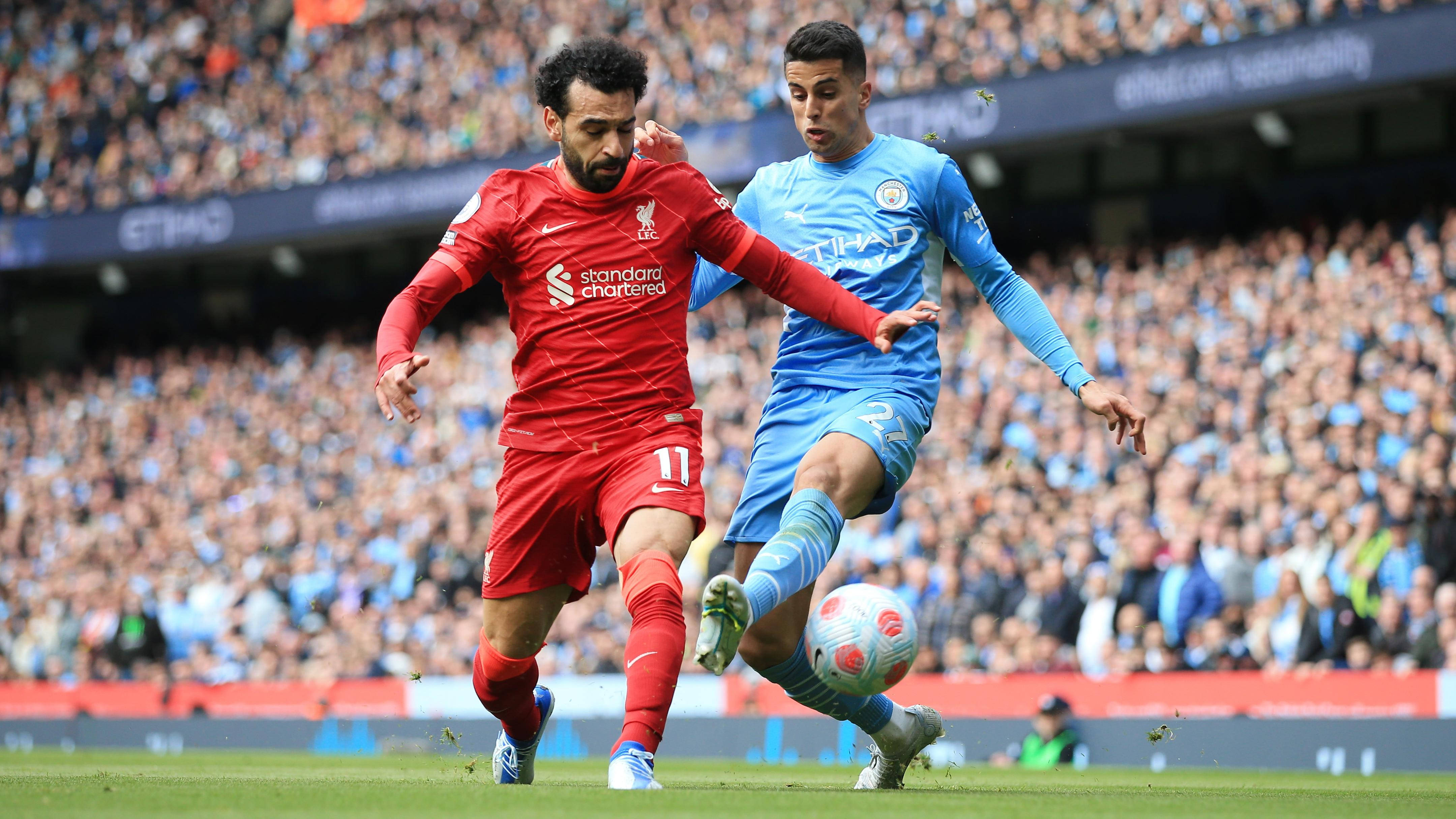João Cancelo teenoor Mohamed Salah Muurpapier