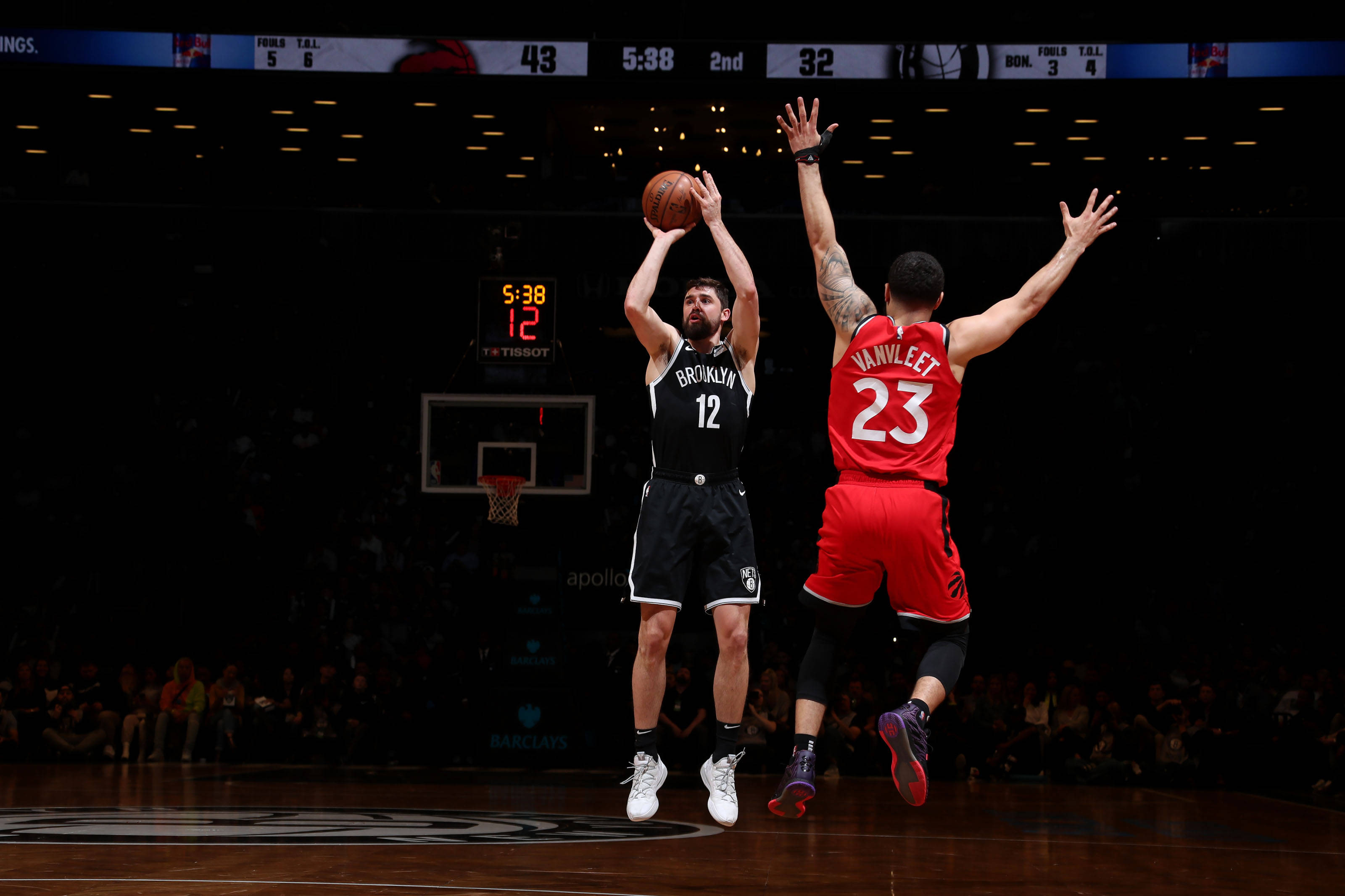 Joe Harris teen Vanvleet Muurpapier