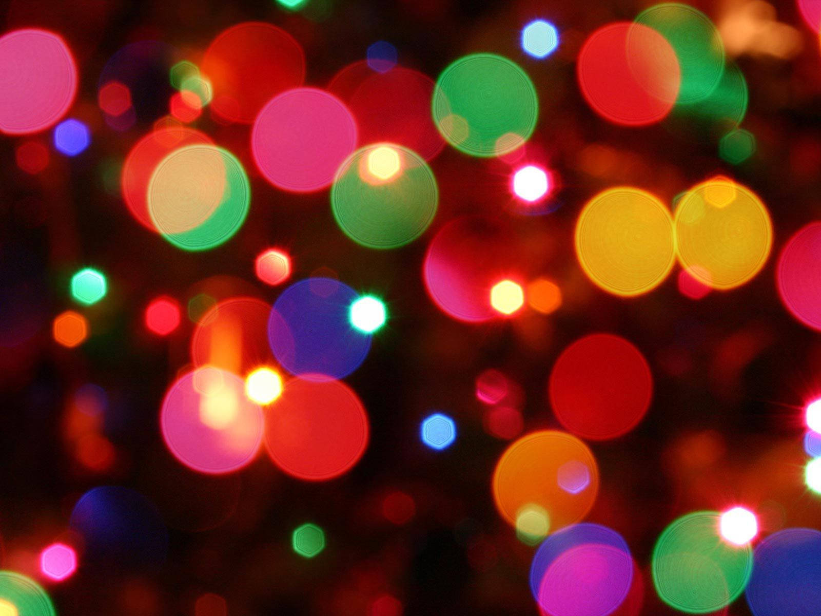 Kleurvolle Feestelike Kersfeesliggies Bokeh-skoot Muurpapier