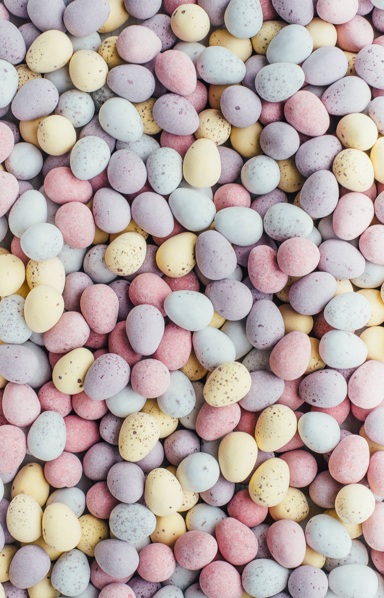 Kleurvolle Paaseiers bymekaar versamel — Pastel estetiese GIF Muurpapier