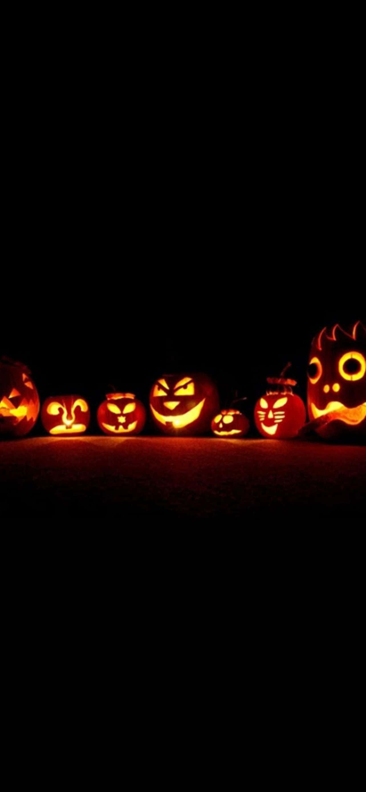 Kom in die Halloween-gees met hierdie iPhone-agtergrond Muurpapier