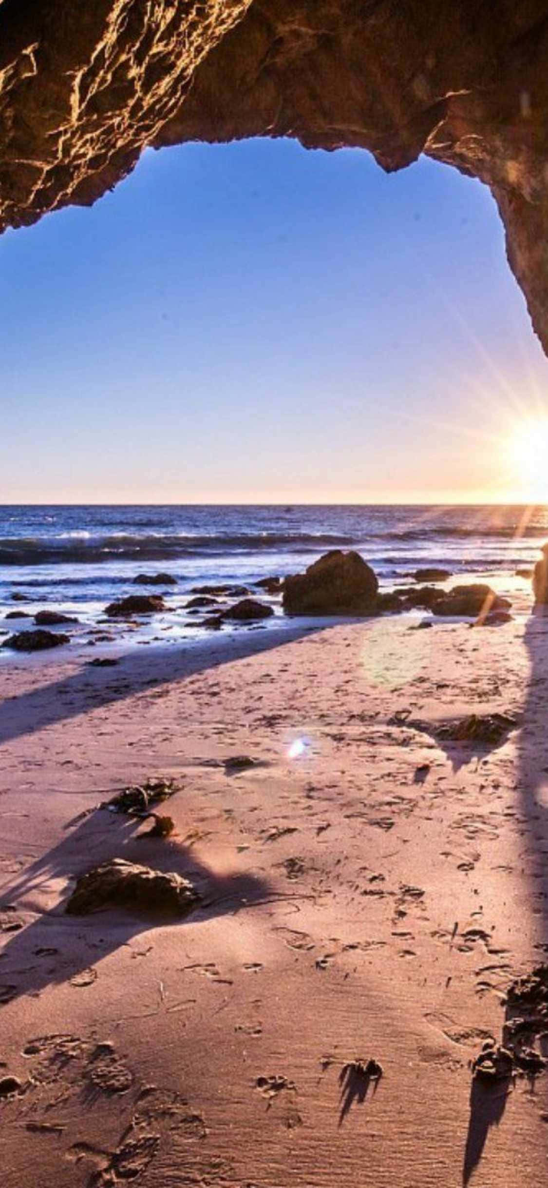 Kusvibes in iPhone Xs Malibu Muurpapier