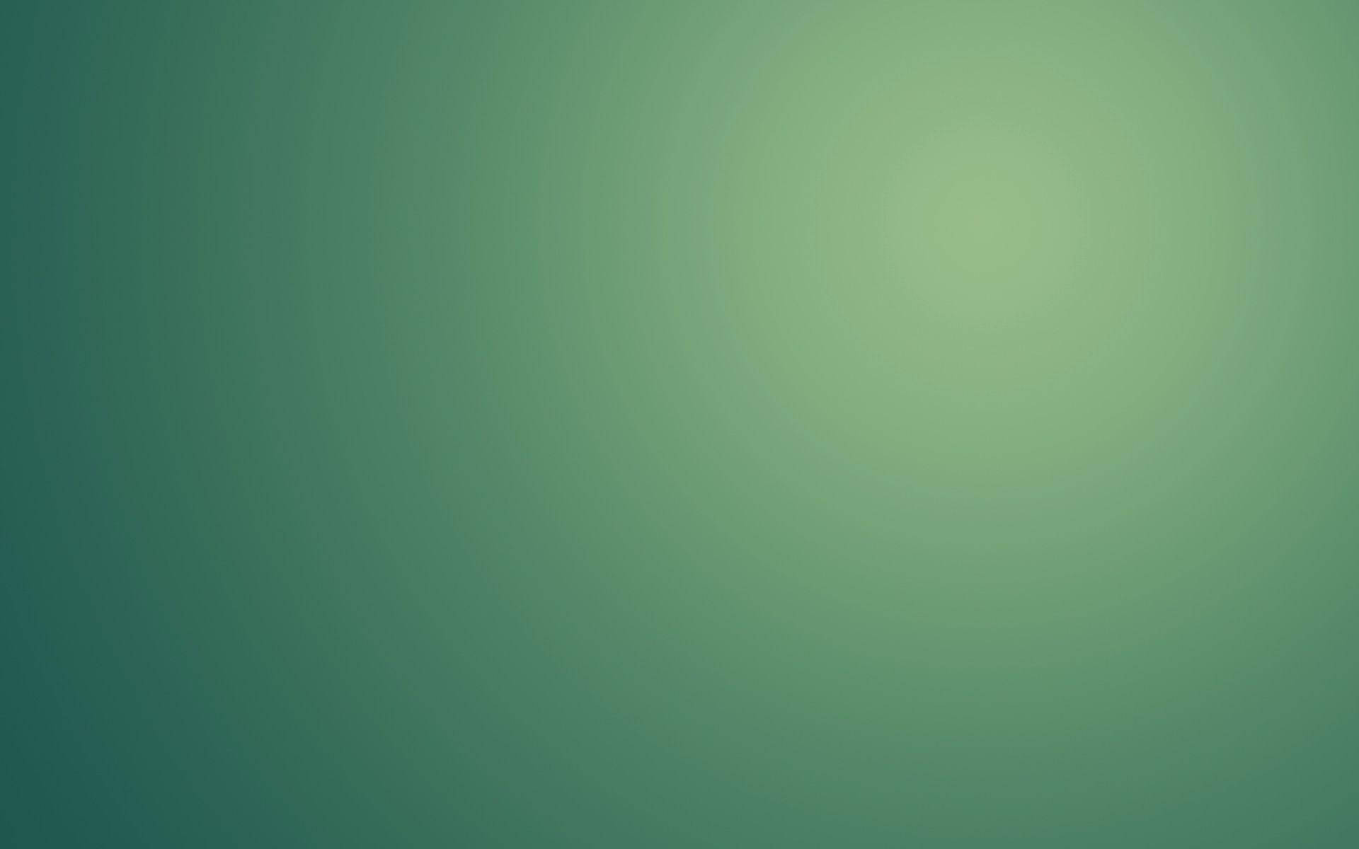 Ligte Groen Gloed op Donker Muurpapier