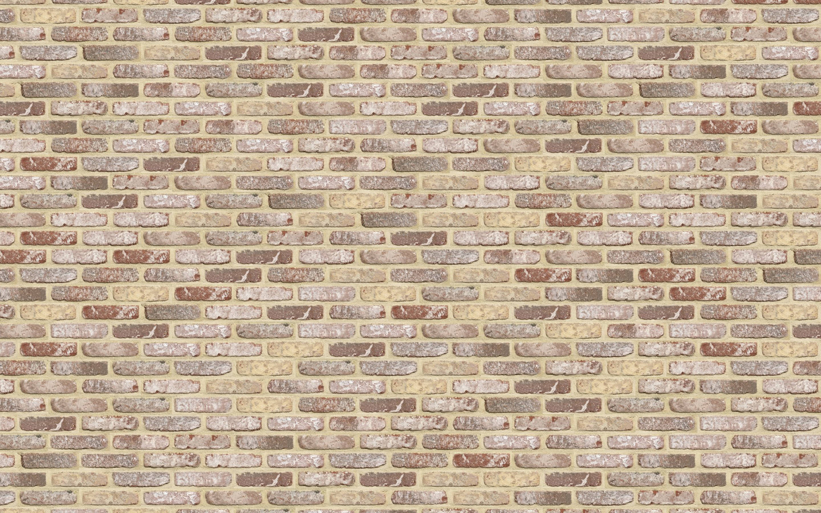 Ligte klipmuur met bakstene Muurpapier
