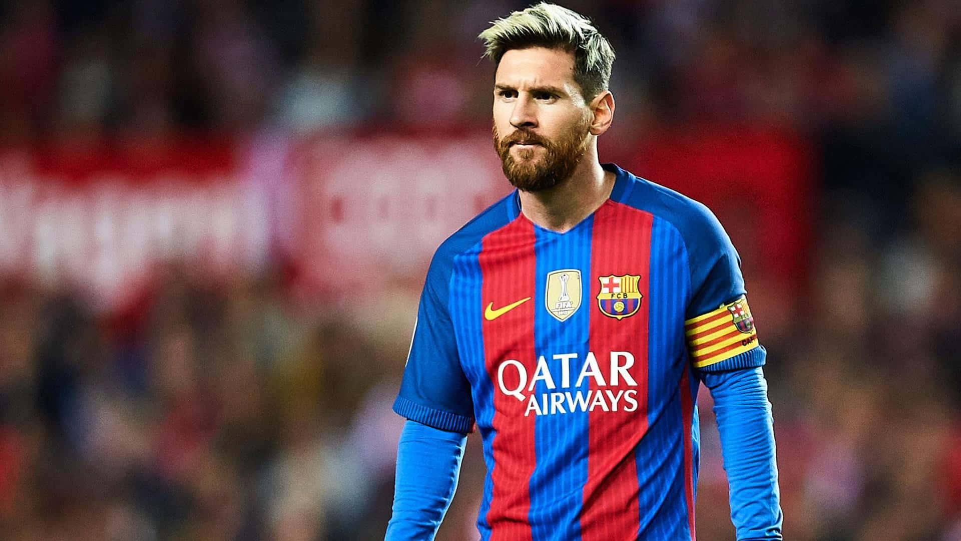 Lionel Messi, kaptein van FC Barcelona, in 'n pragtige aksiefoto. Muurpapier