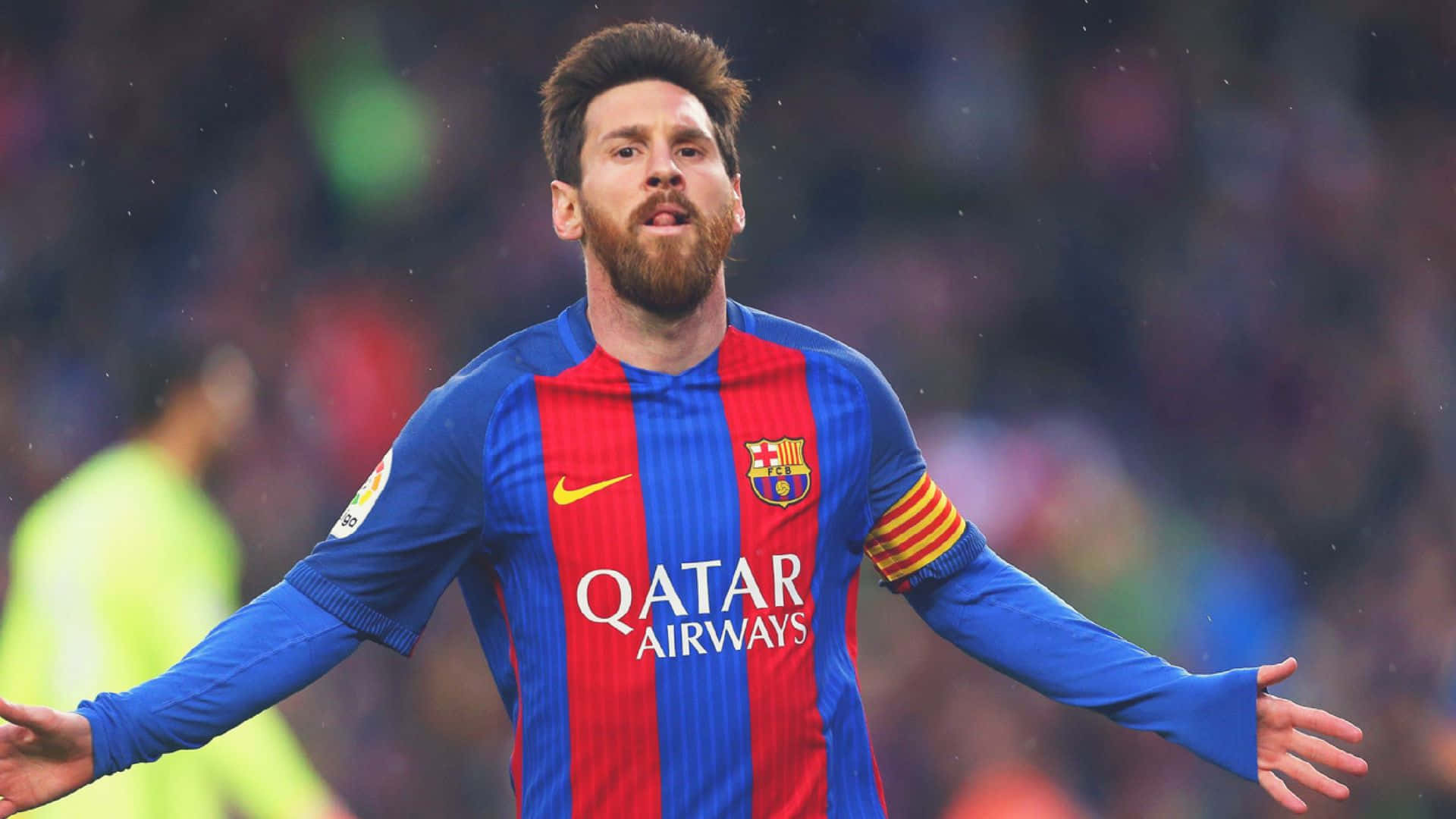 lionel messi vier sy doel tydens 'n wedstryd Muurpapier