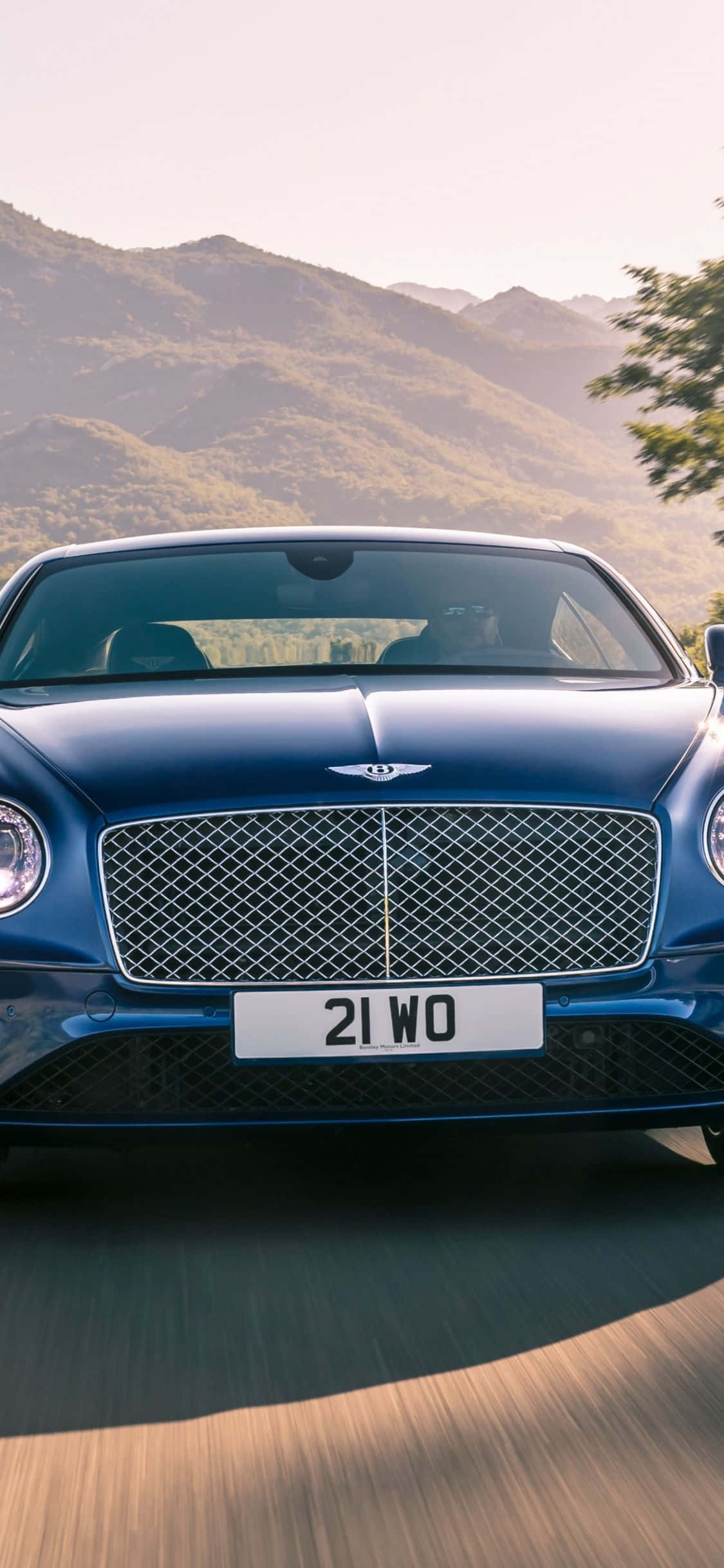 Onderskrif: Luukse rit in 'n Bentley met iPhone Muurpapier