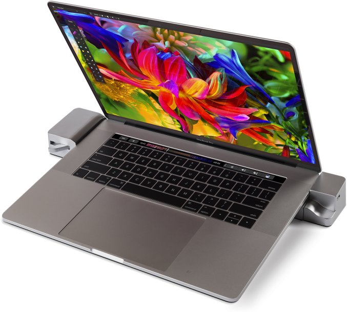 Mac Book Pro met Kleurvolle Skerm en Bykomstighede Muurpapier