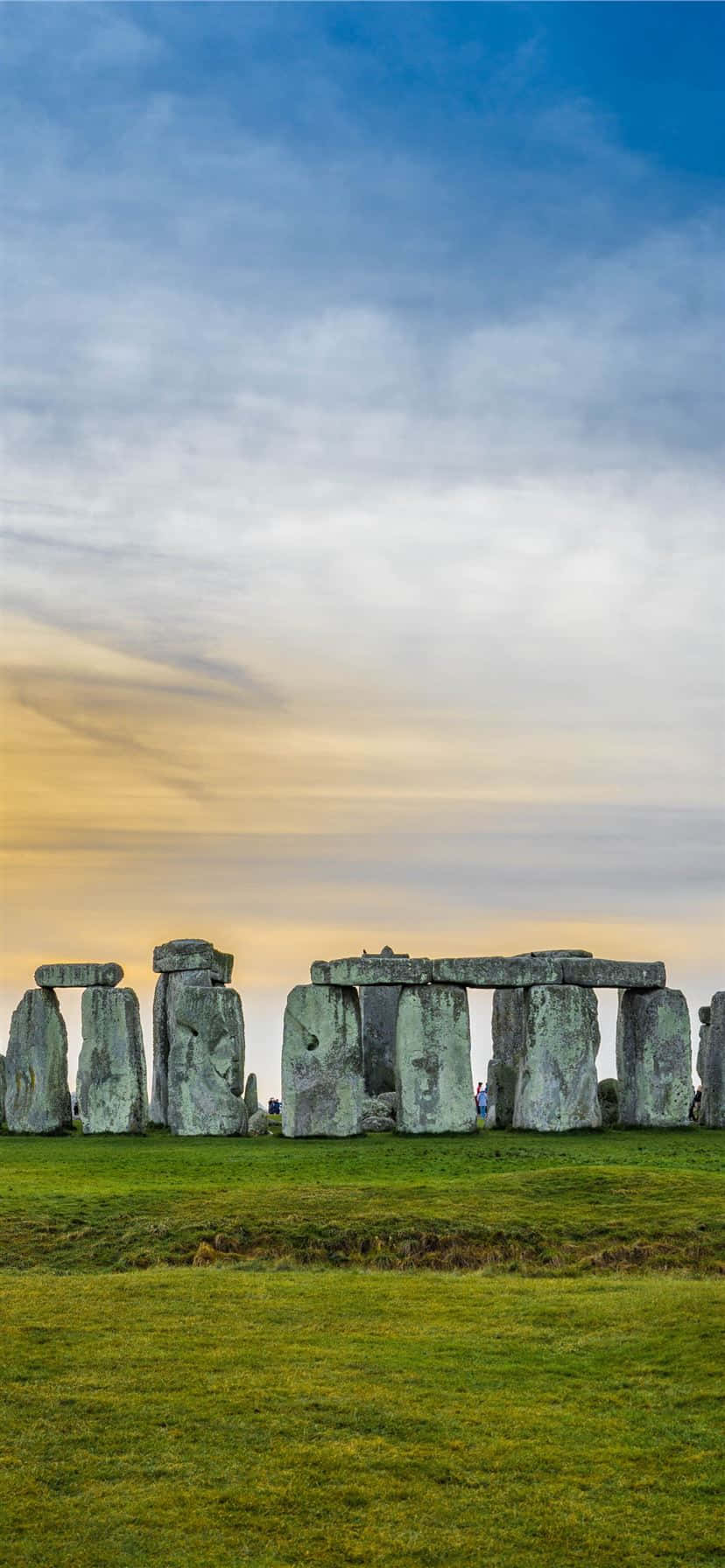Majestueuse uitsig oor Stonehenge teen Sondergang Muurpapier