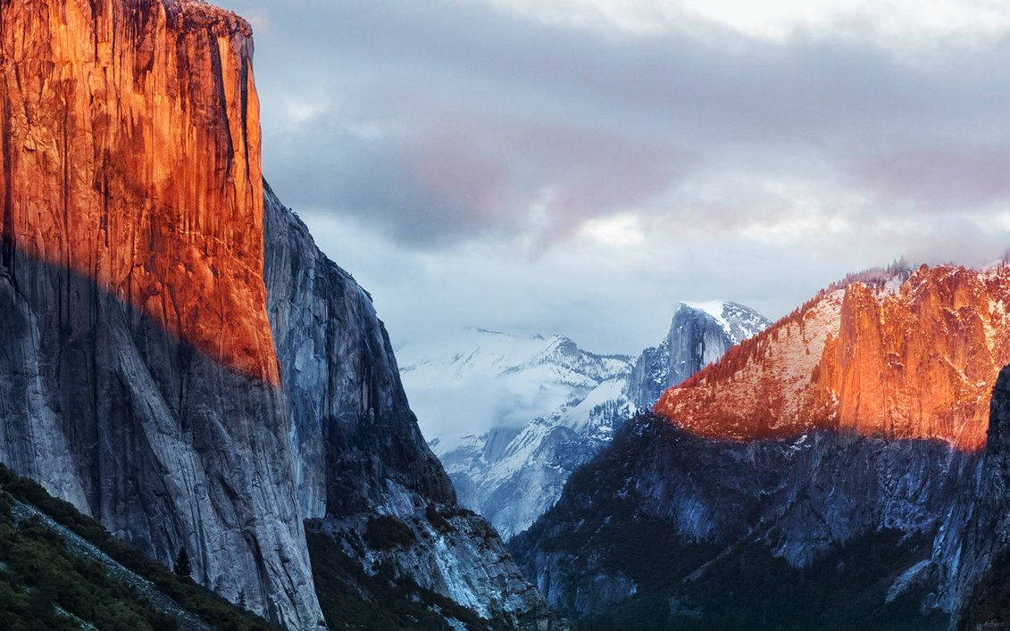 Majestueuse Yosemite-berg vanuit die oogpunt van 'n MacBook Pro Muurpapier