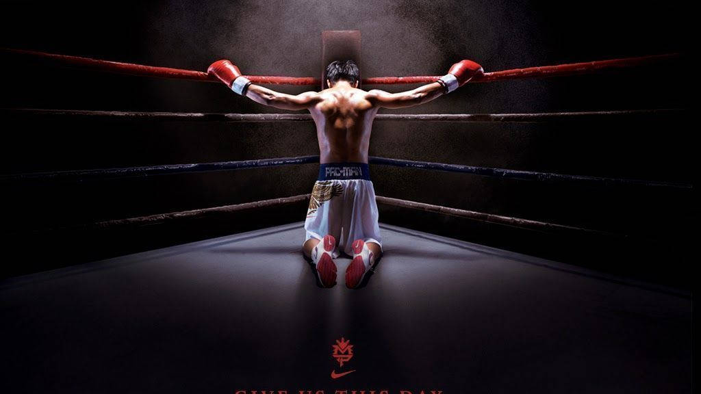 Manny Pacquiao Knielend Muurpapier