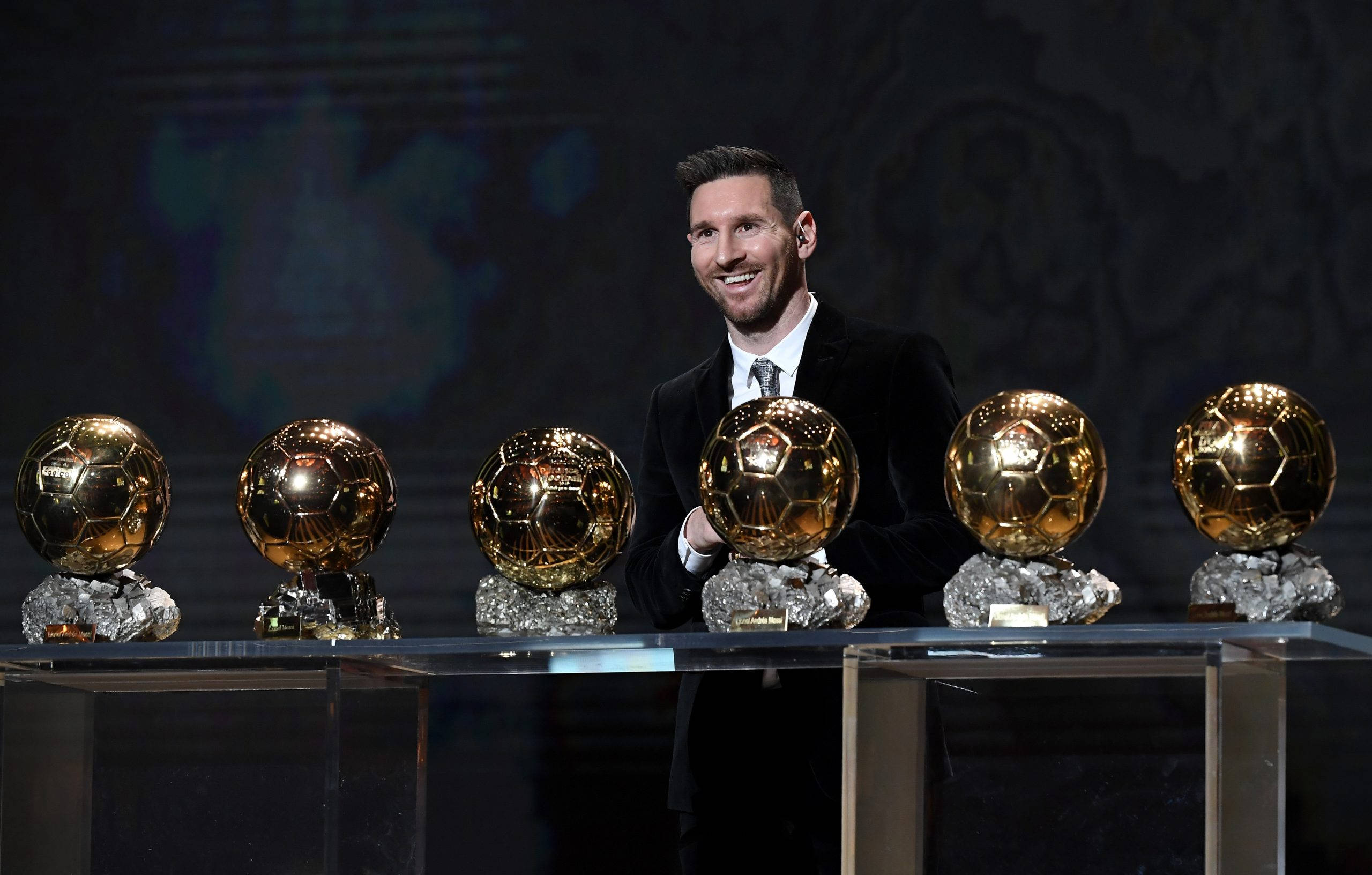 Messi 2021 Ballon d'Or-trofeë Muurpapier