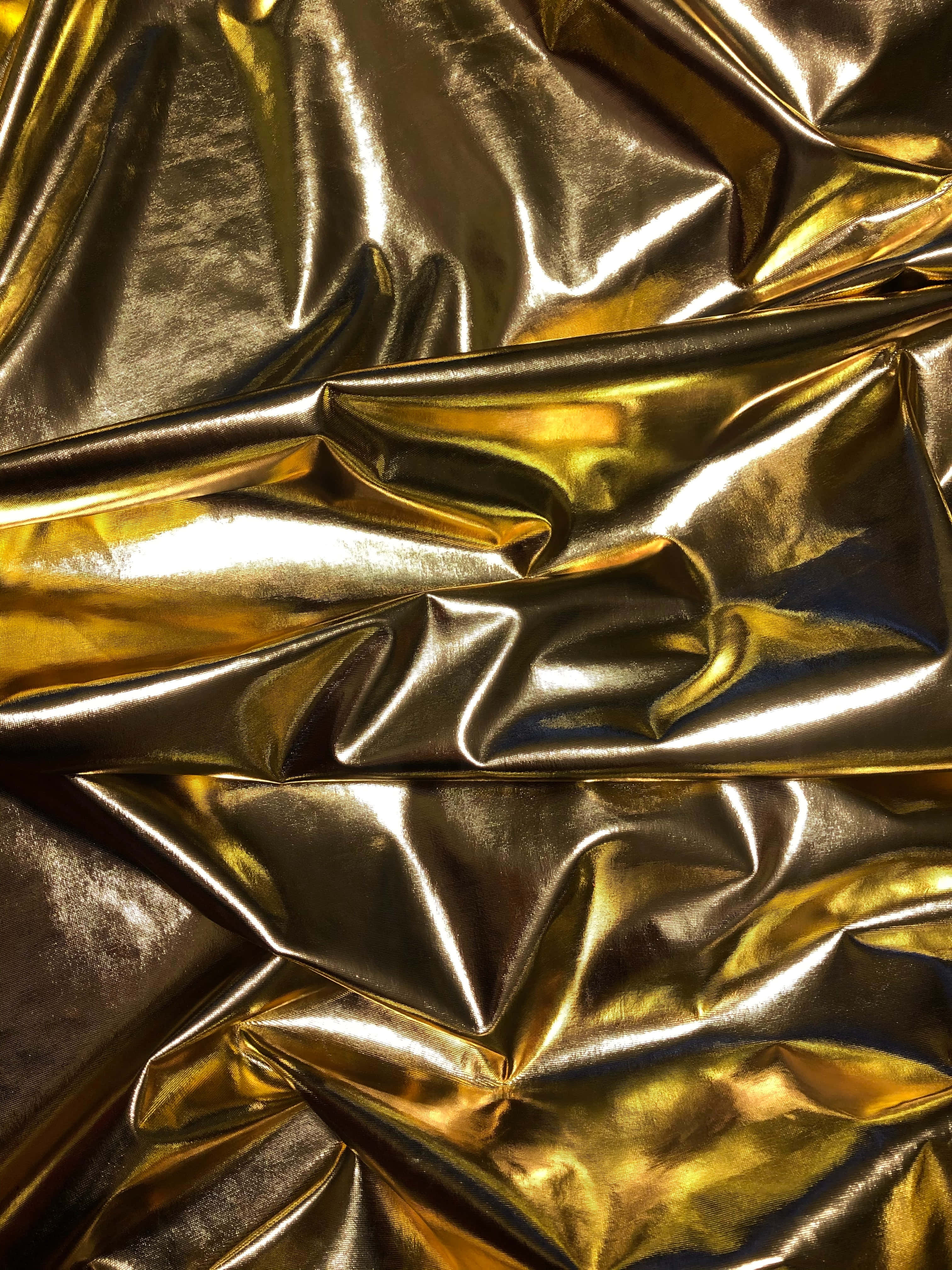 Metaalagtige Stof Goud Agtergrond Muurpapier