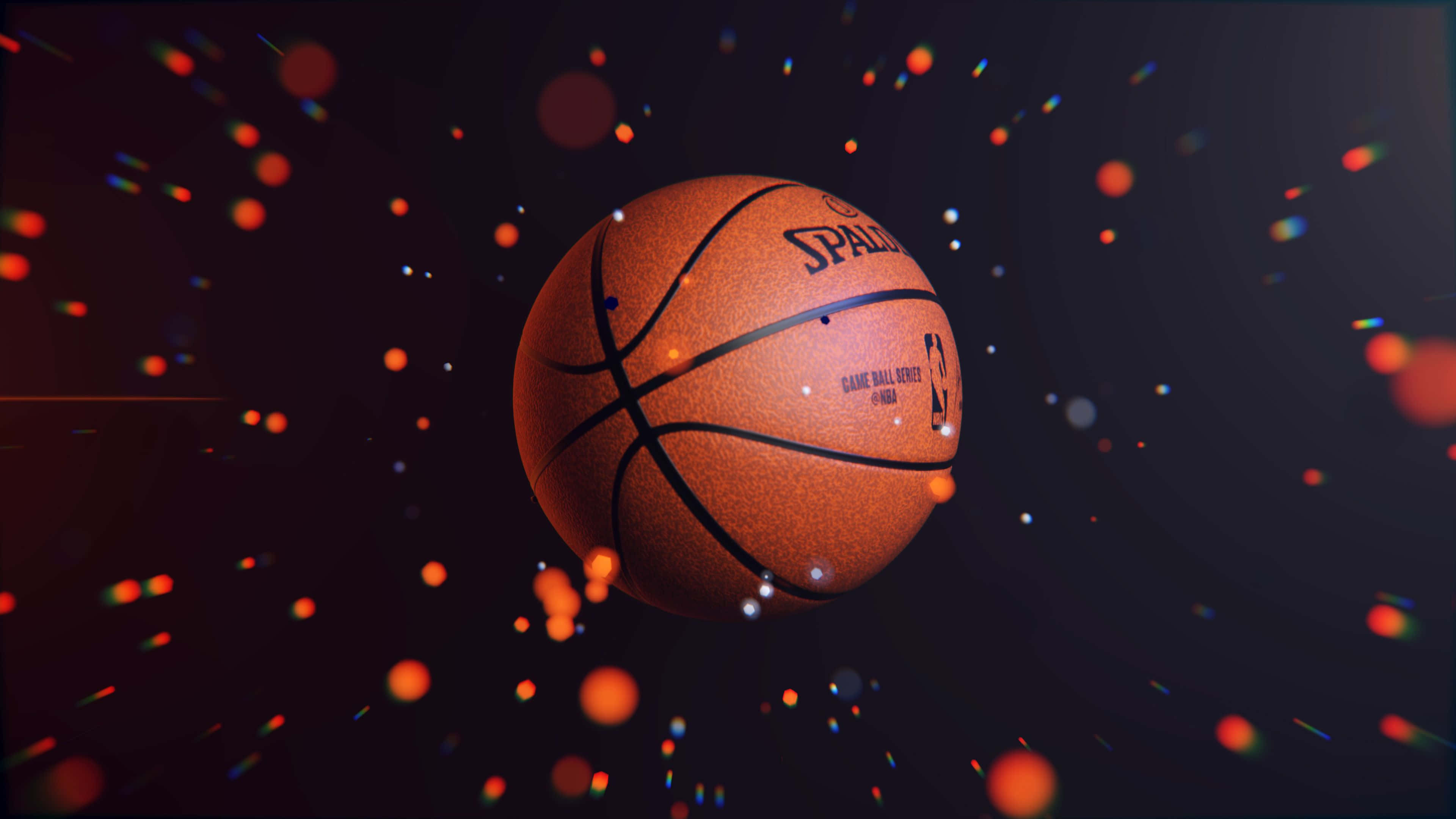 n basketbal met oranje en rooi ligte Muurpapier