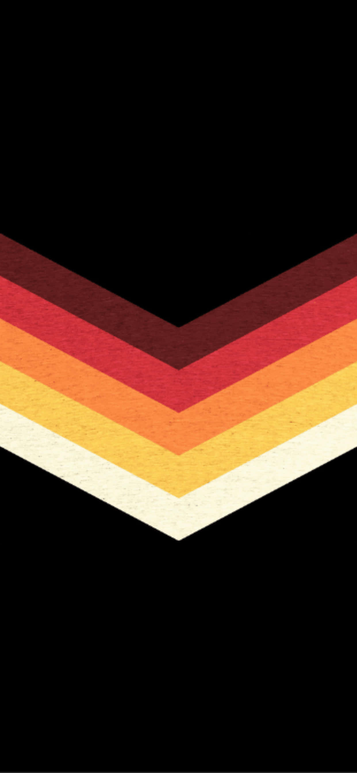 'n chevron met 'n rooi, oranje, geel en blou kleur Muurpapier