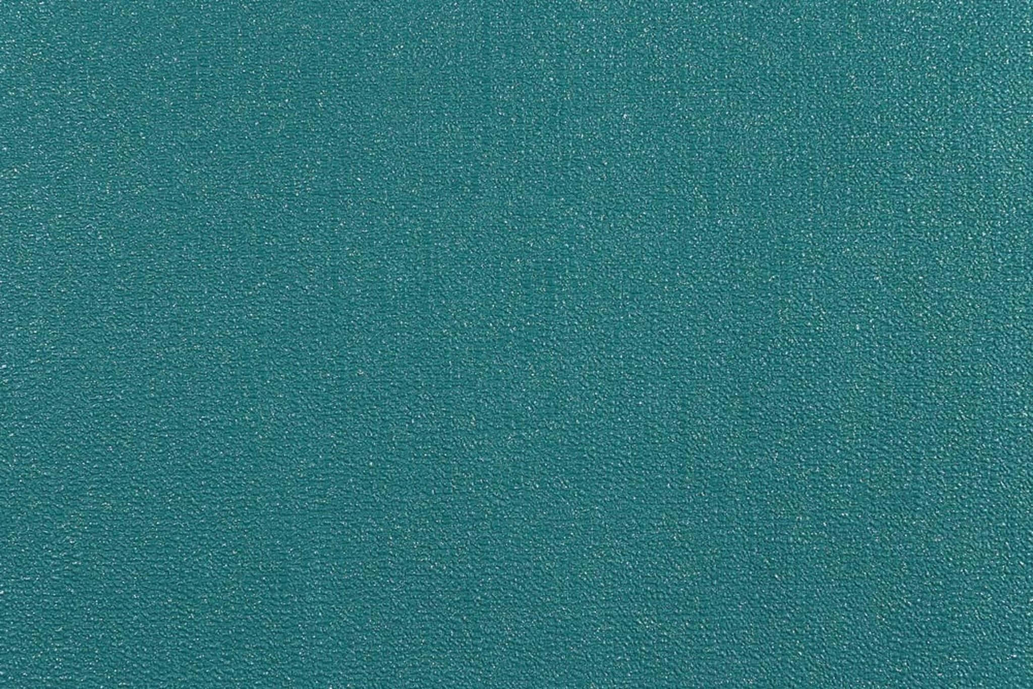 'n Diep smaraggroen agtergrond, perfek vir elegante projekte Muurpapier