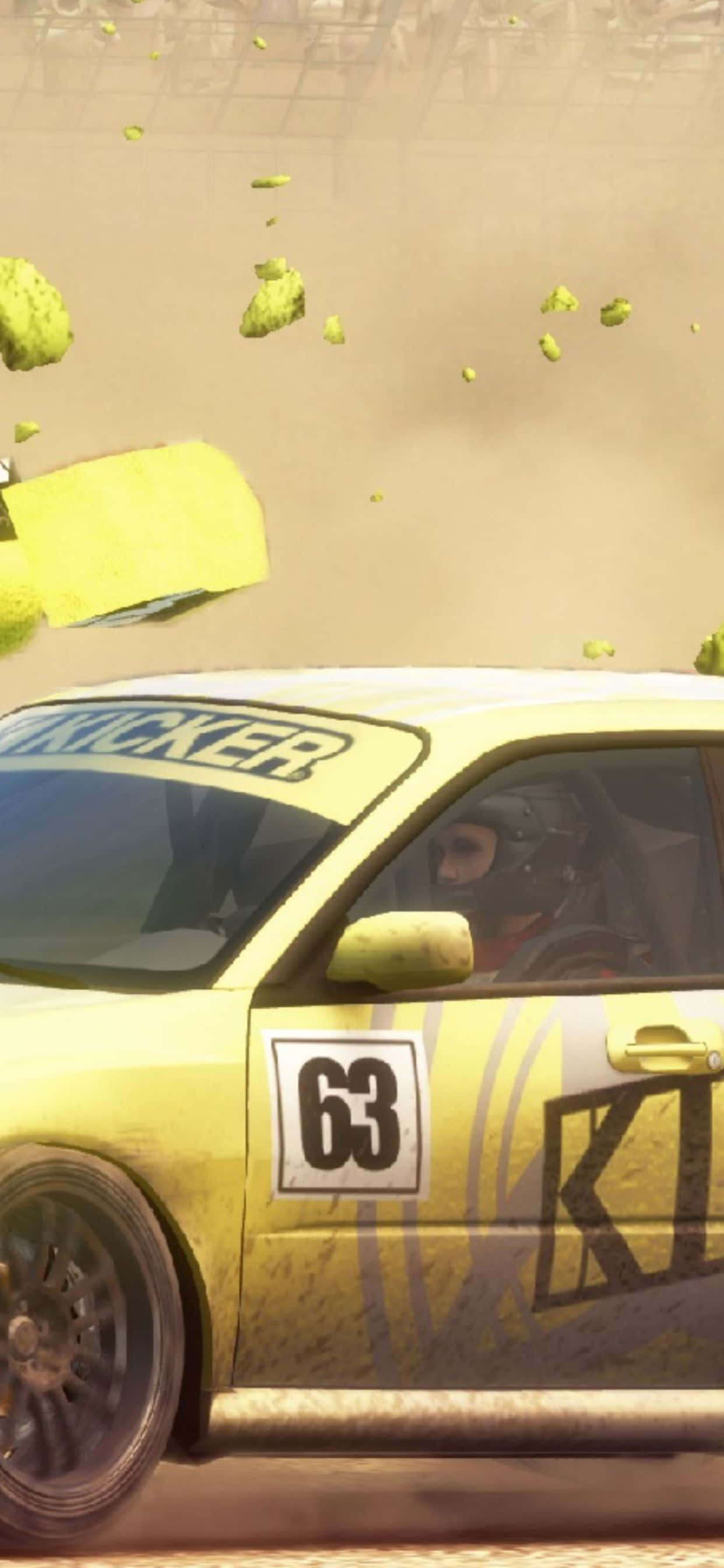 'n geel motor wat deur die grond ry Muurpapier