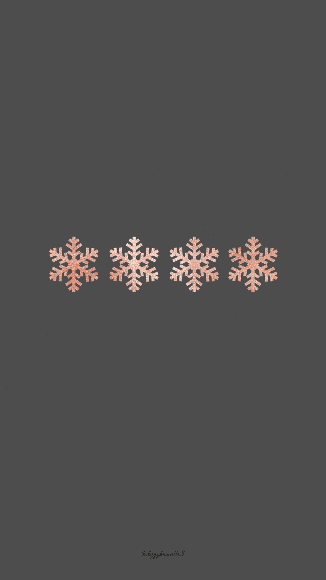 'n Grys agtergrond met sneeuvlokkies daarop Muurpapier