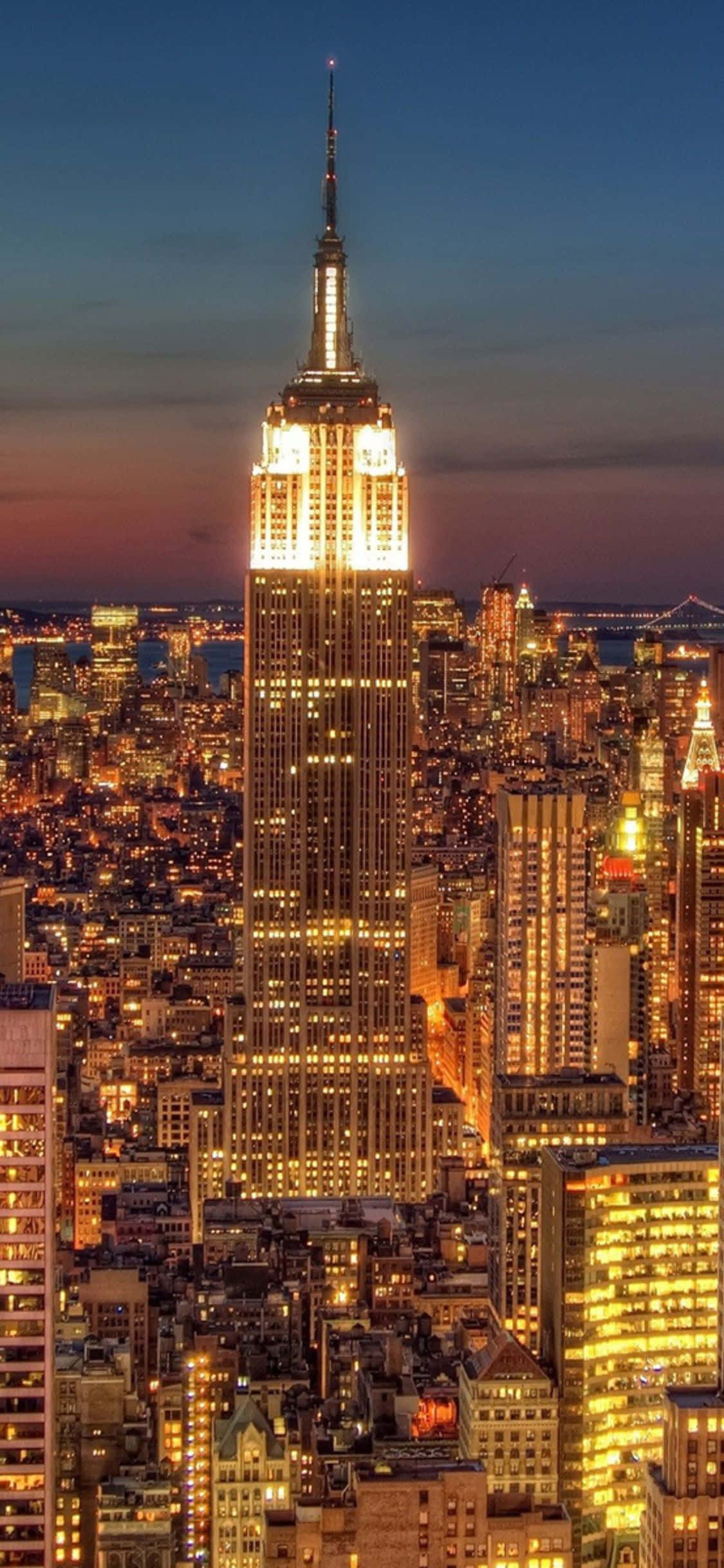 'n Oogvangende uitsig van die Groot Appel - New York Stad Muurpapier