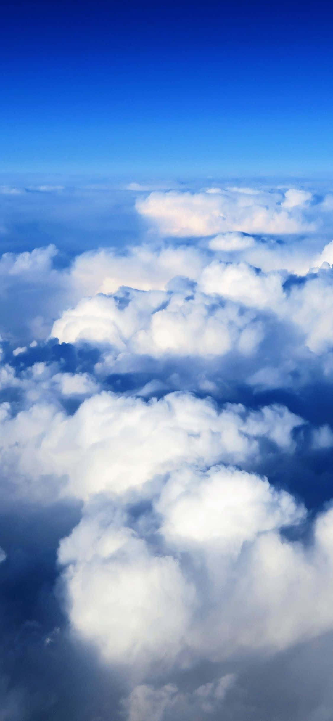 'n Perfekte blou lug met pragtige wit wolke Muurpapier