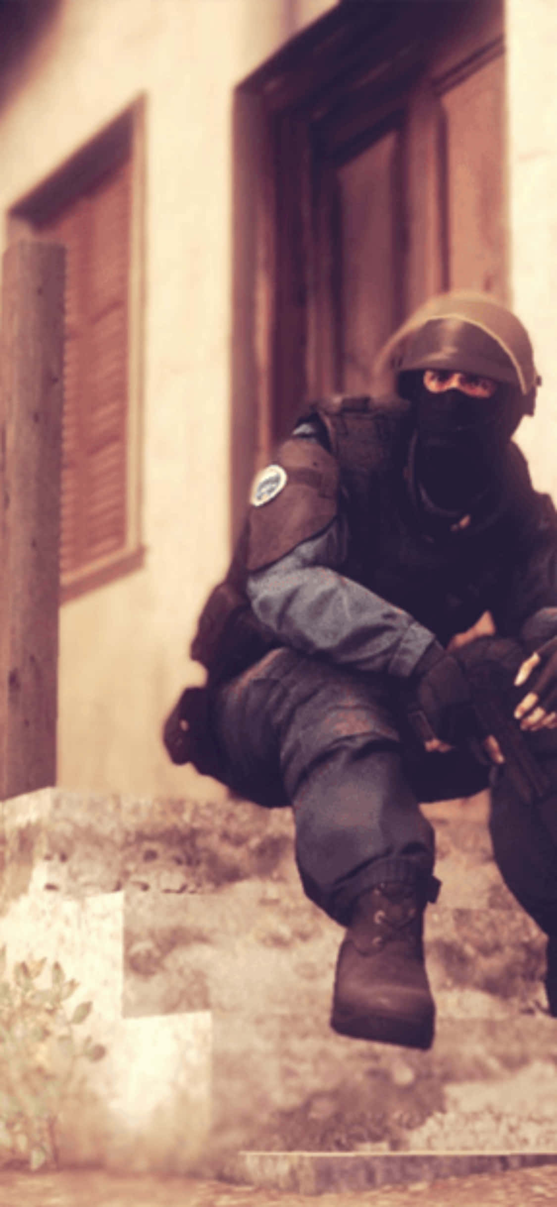'n Professionele Speler Ding mee in Counter-Strike: Global Offensive op 'n iPhone XS Muurpapier
