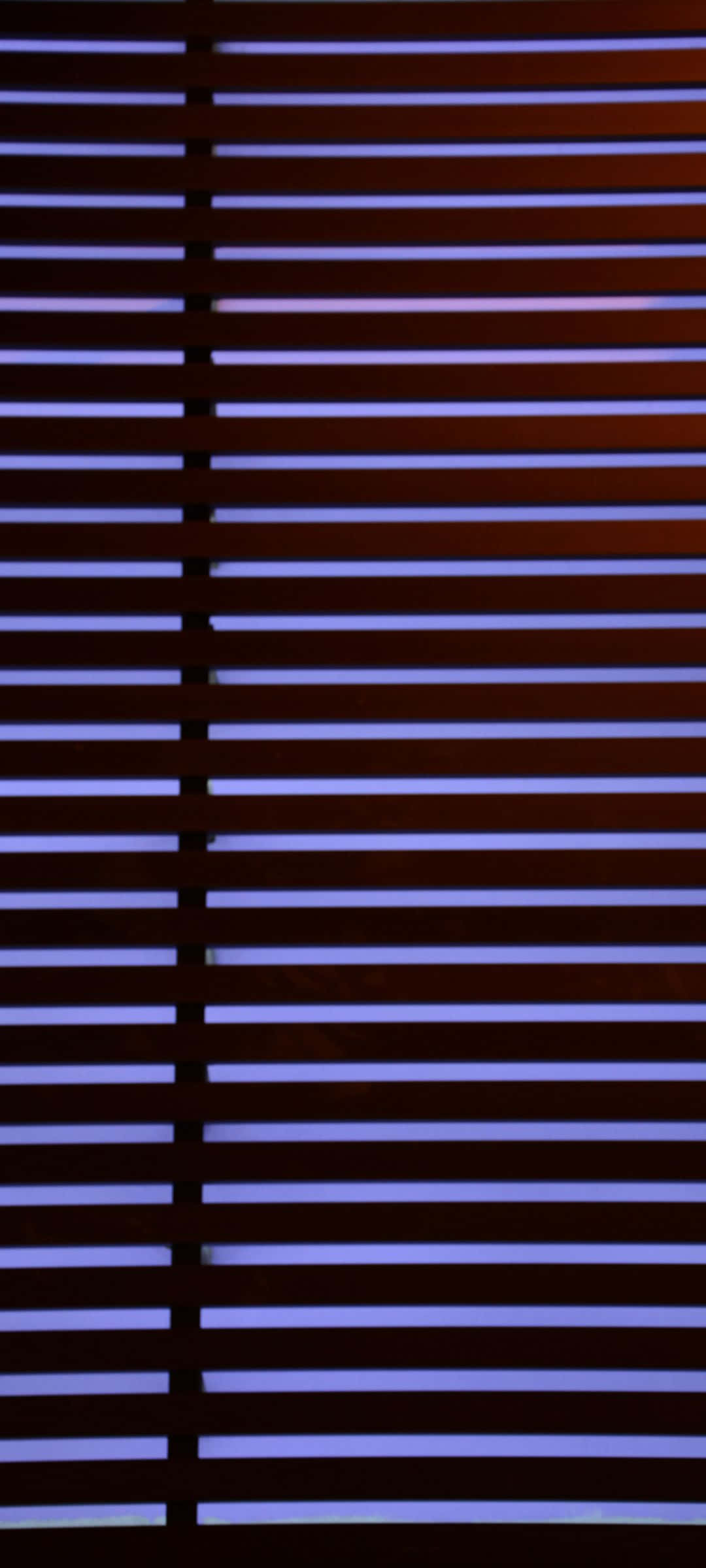 'n Rustige en Kleurvolle Sonsondergang oor die Oseaan Muurpapier