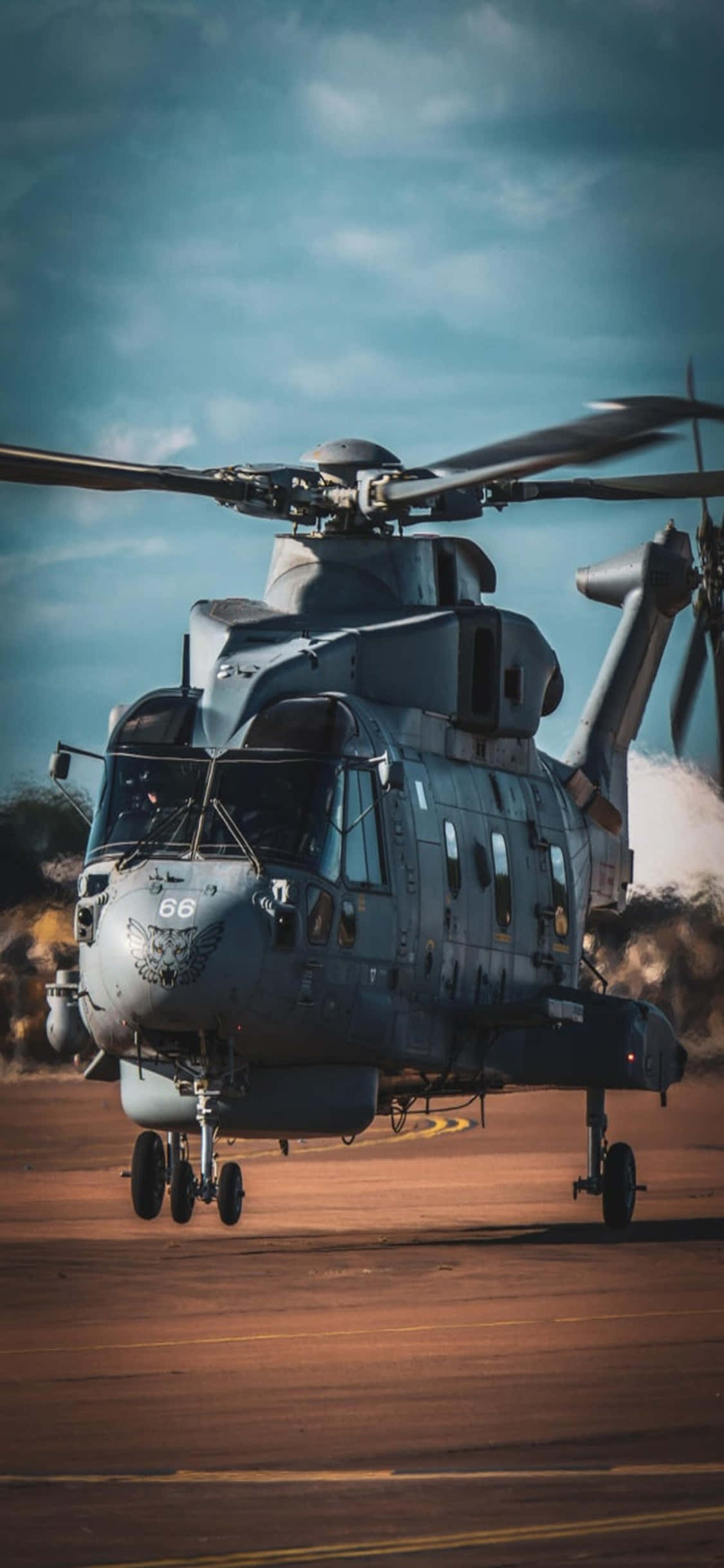 'n Uitsig van die lug vanuit 'n helikopter, met 'n iPhone Xs Muurpapier