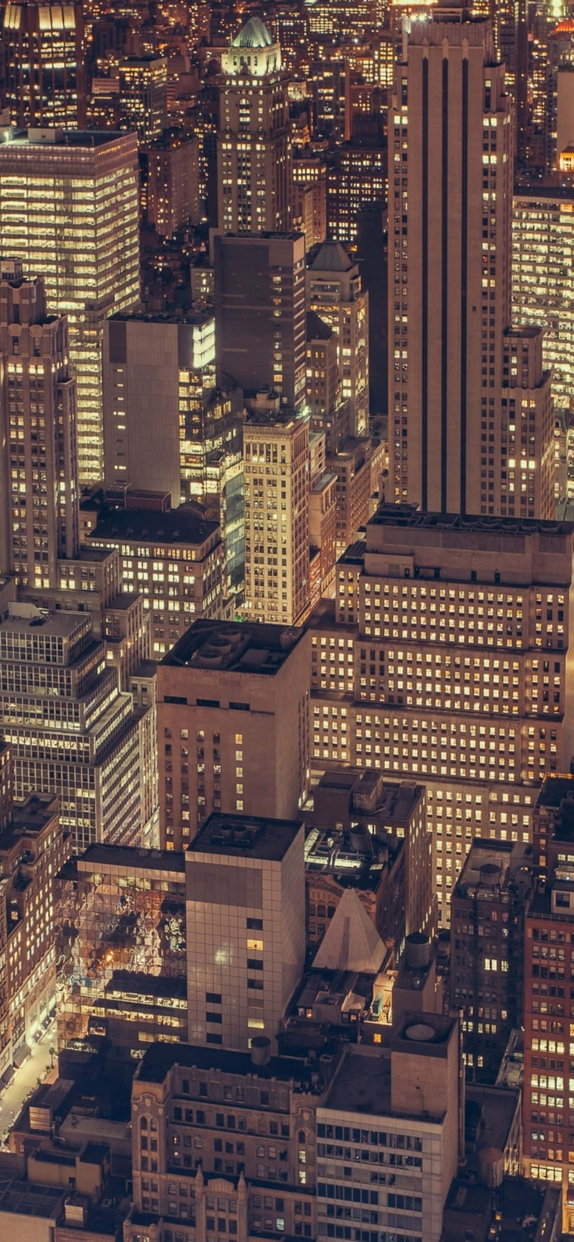 Neem al die besienswaardighede wat New York bied in met hierdie wonderlike iPhone X-agtergrond van die stad Muurpapier