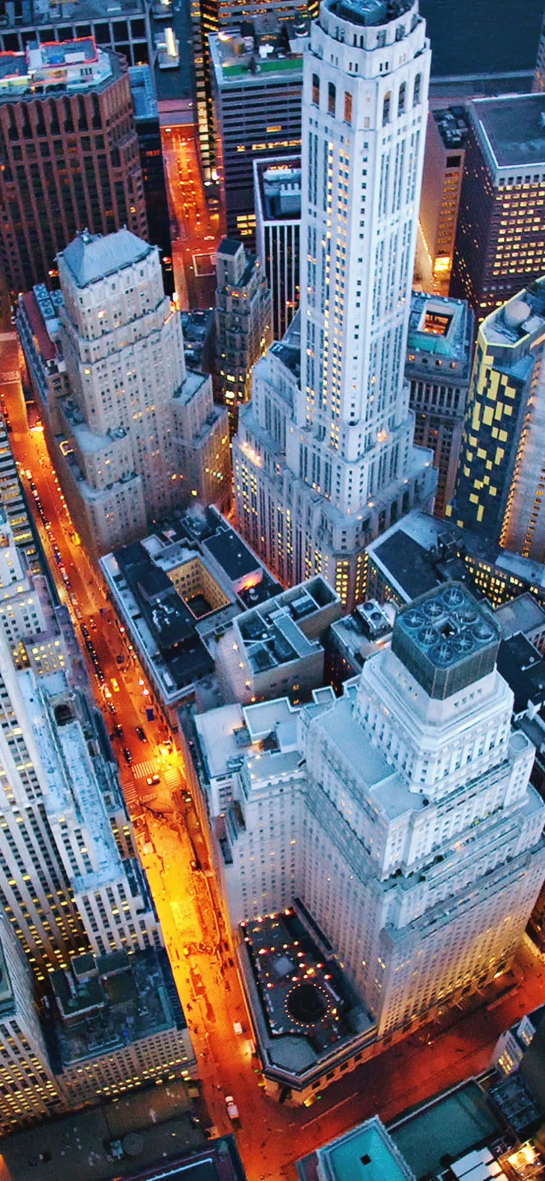 Geniet die skoonheid van 'n sonsondergang in New York Stad met die iPhone Xs Muurpapier