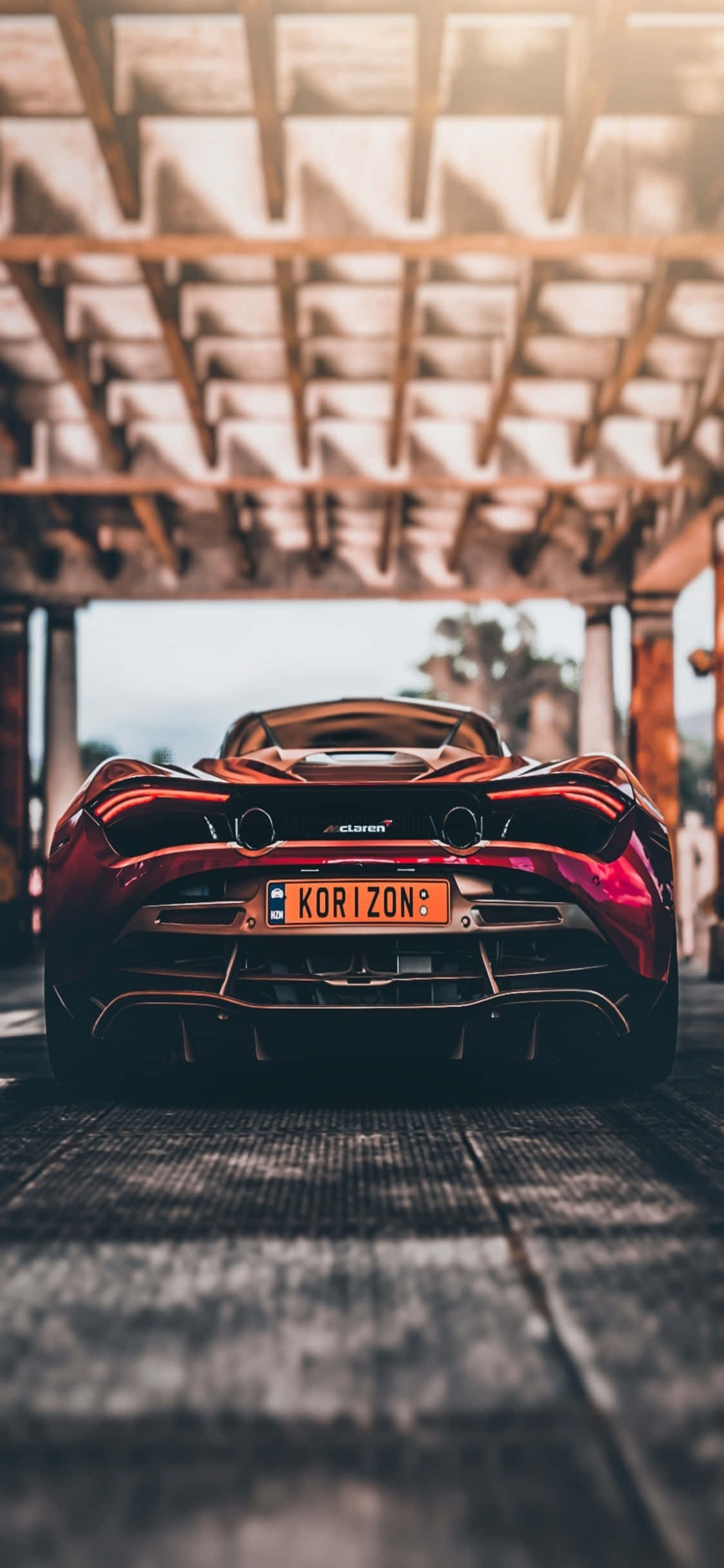 Agter die stuur van die iPhone Xs McLaren 720s Muurpapier