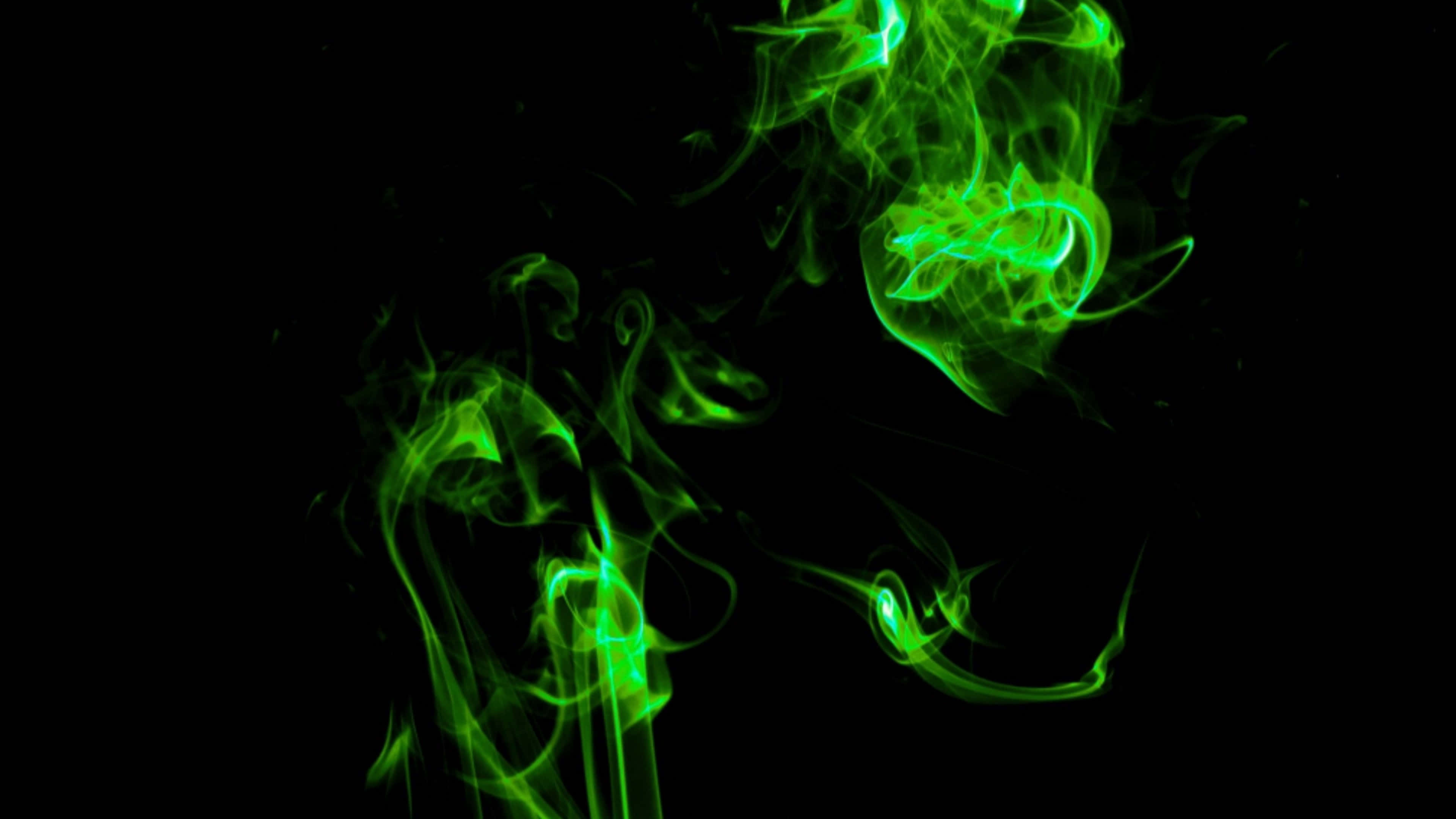 Neon Groen Rook Wat Swaai In Swart Muurpapier
