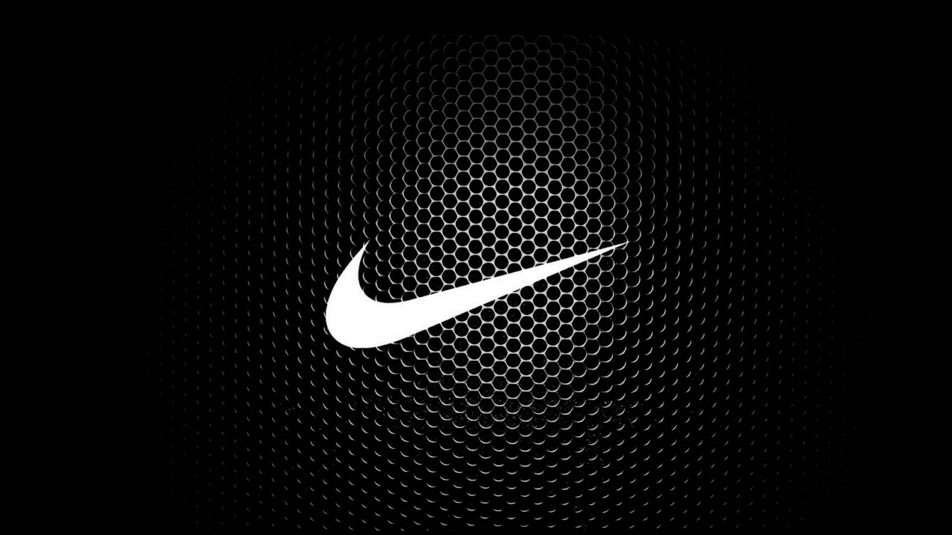 Nike-embleem met koel heksagoonpatroon Muurpapier