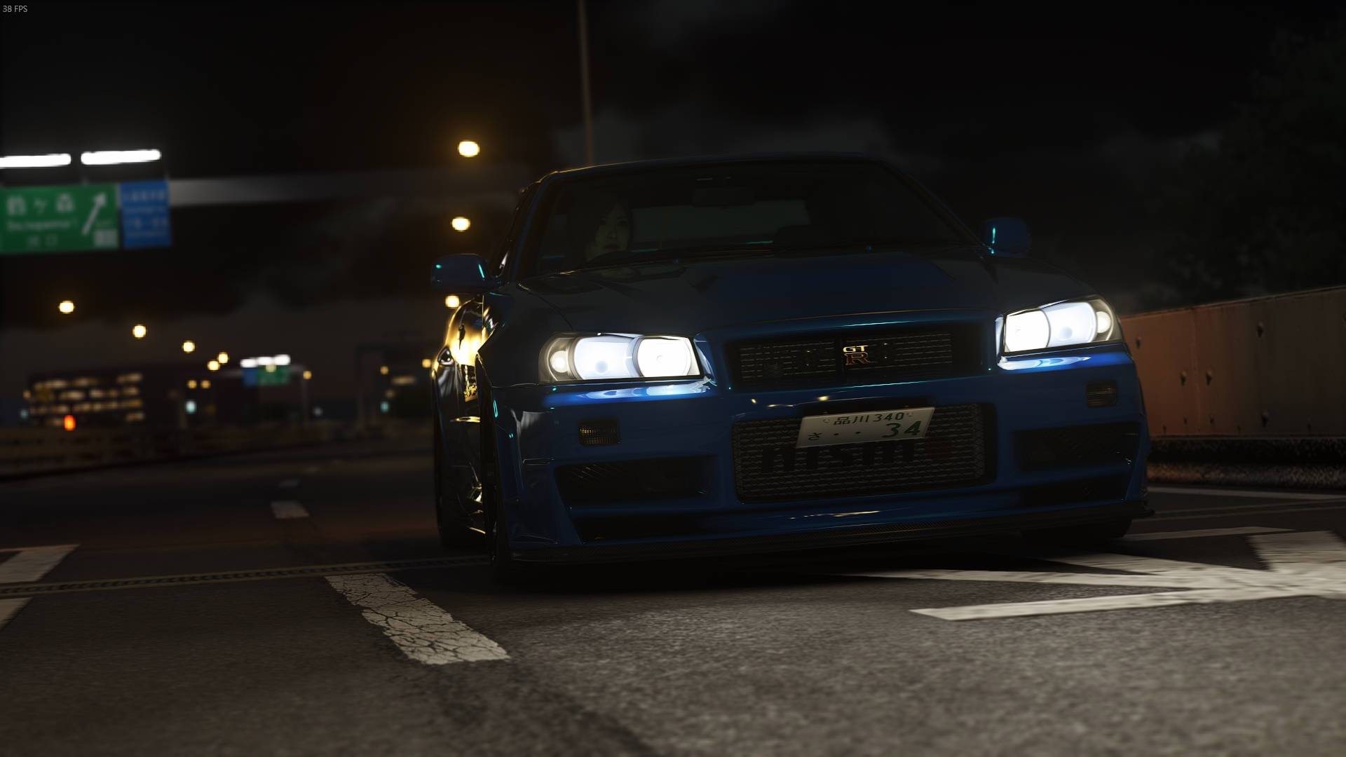 Nissan Skyline GTR R34 op snelweg Muurpapier