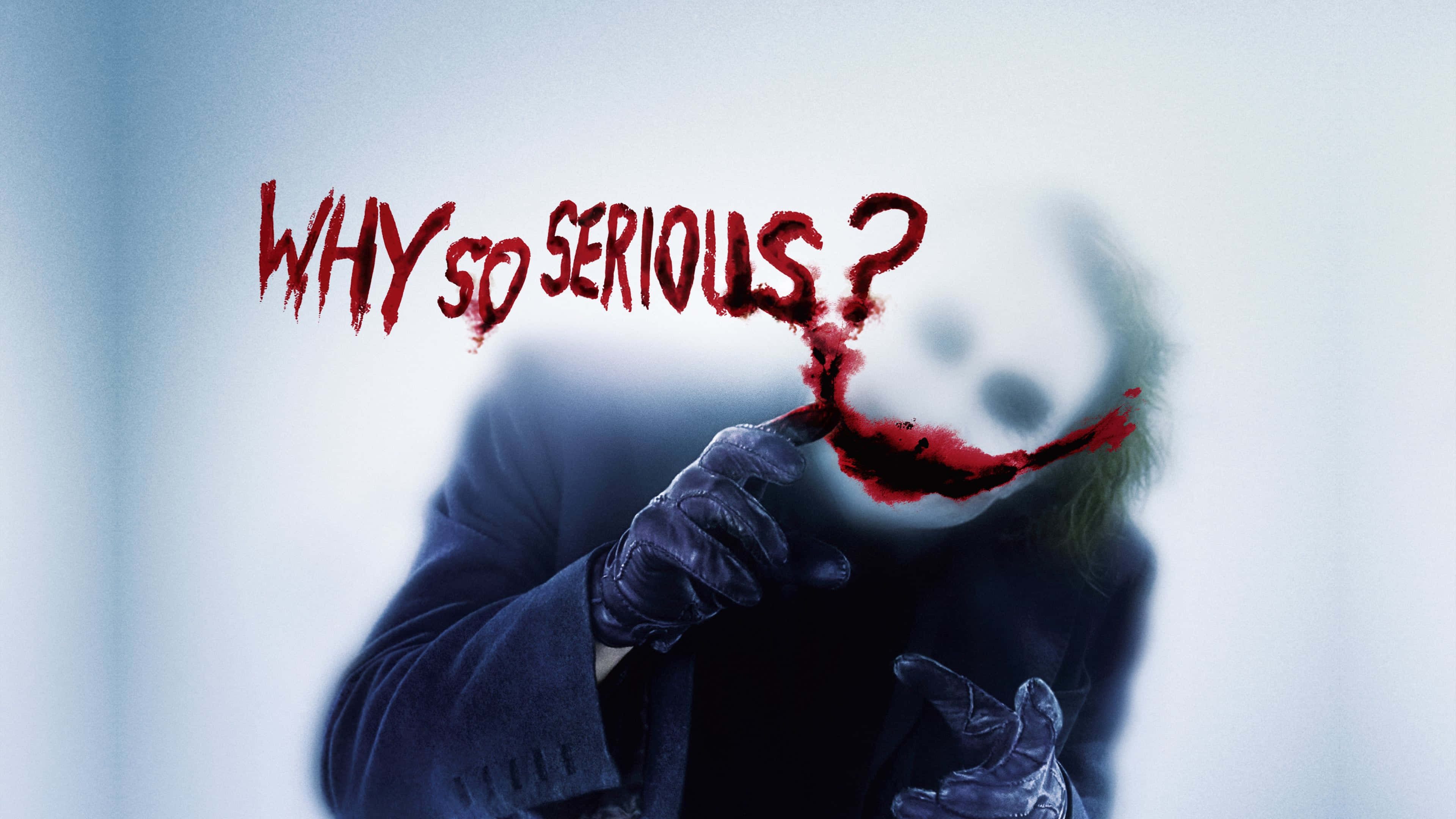 Onderskrif: Die Joker van The Dark Knight in 4K Ultra HD wat sy ikoniese slagspreuk vertoon Muurpapier