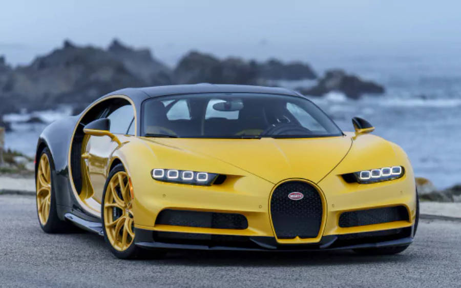 Onderskrif: Majestueuse Geel Bugatti Chiron in 4K Resolusie Muurpapier