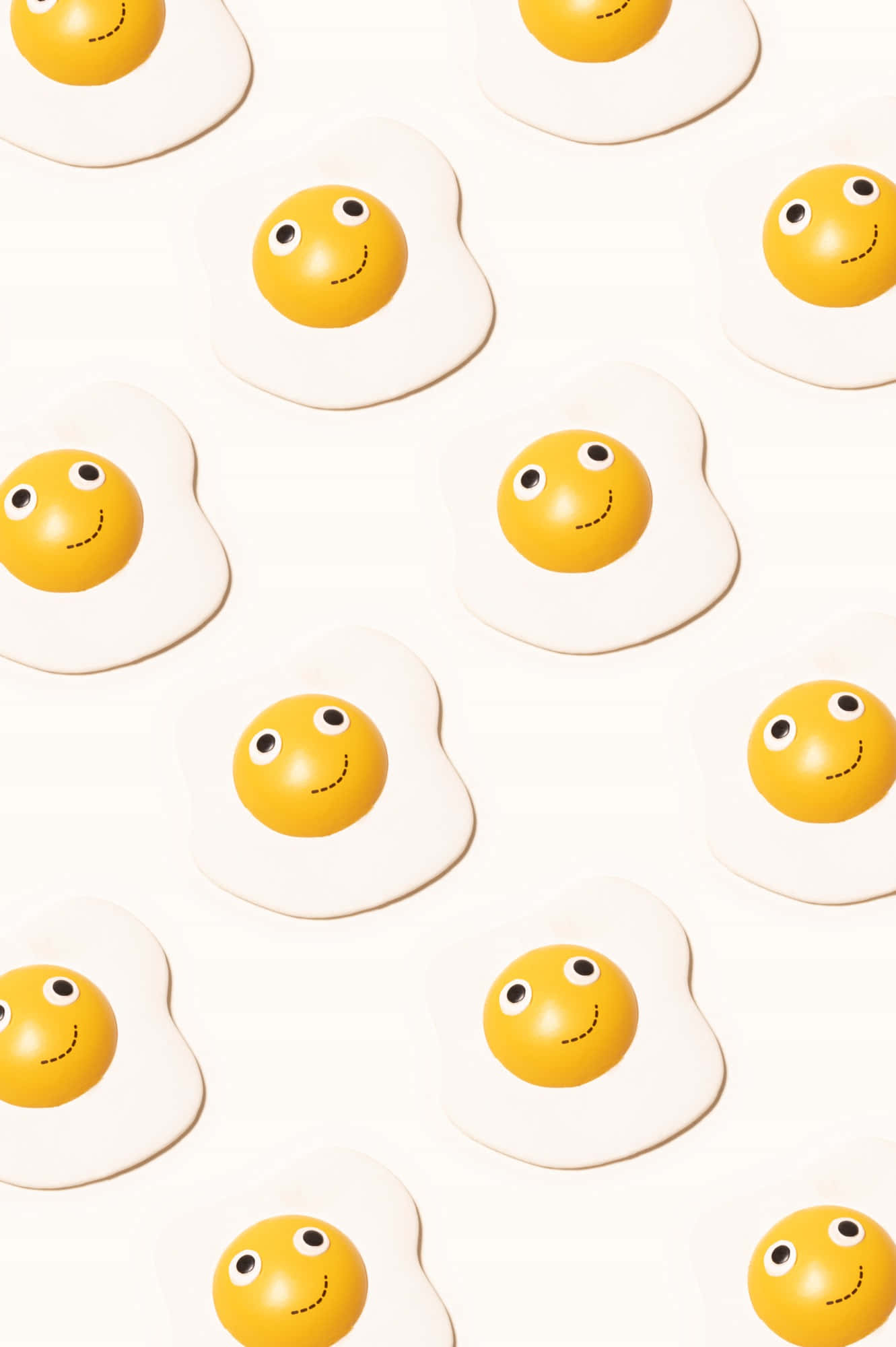 Onderskrif: 'n Lewendige Glimlag-emoji Gemeng met Sonskynkant-eier Muurpapier