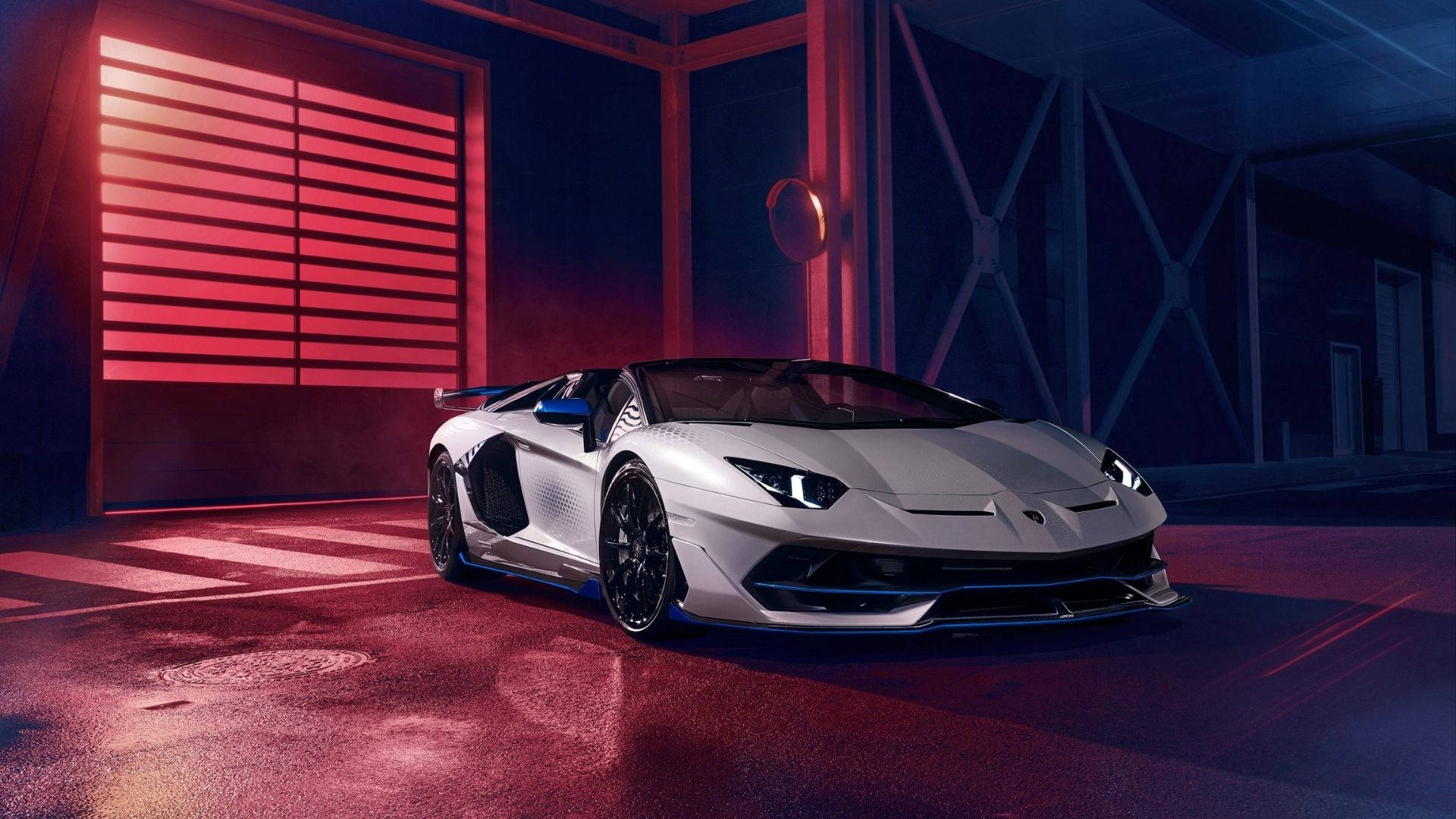 Onderskrif: 'n Pragtige Lamborghini Aventador SVJ Xago in middernagblou Muurpapier
