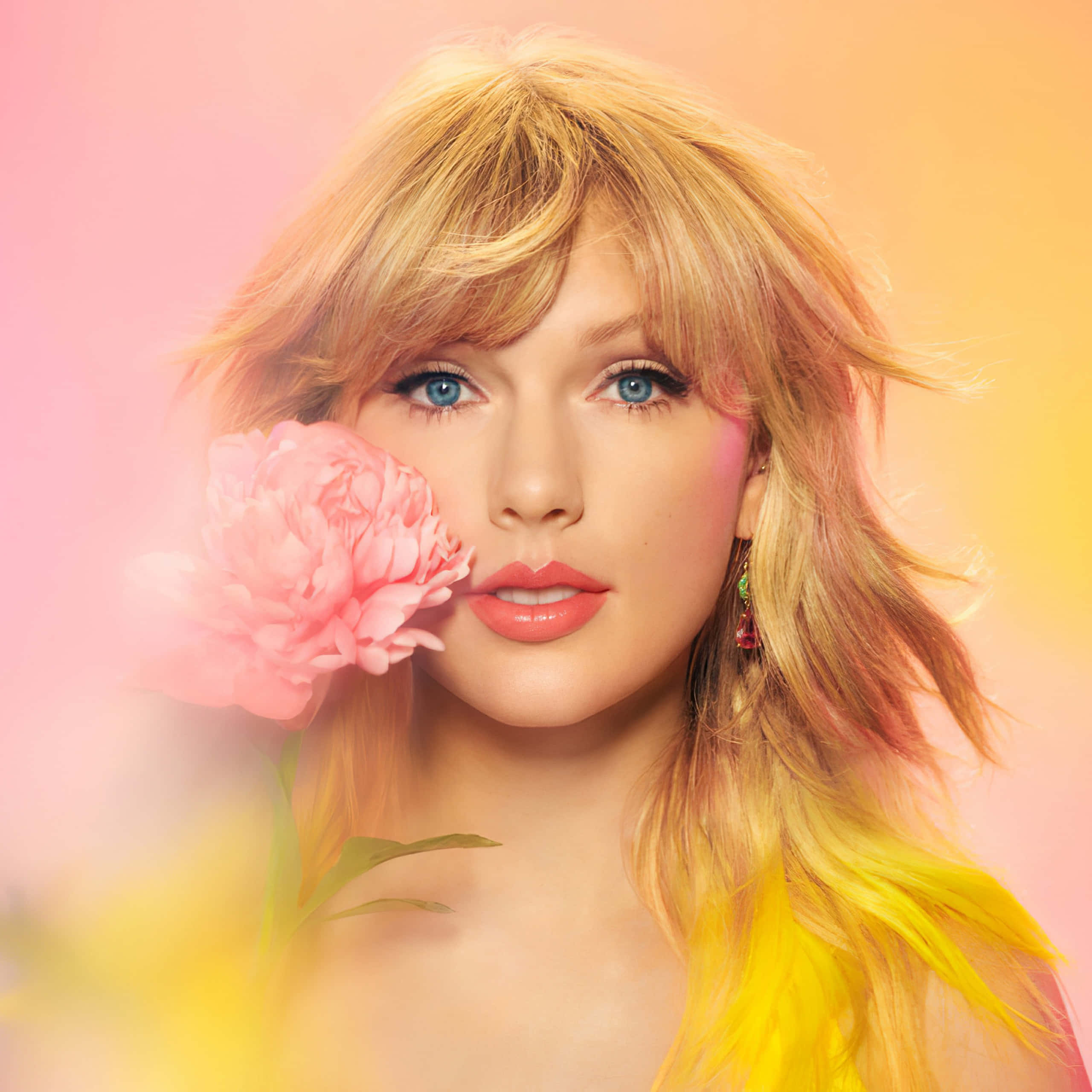 Onderskrif: Taylor Swift Verlig Onder Verhoogligte Muurpapier