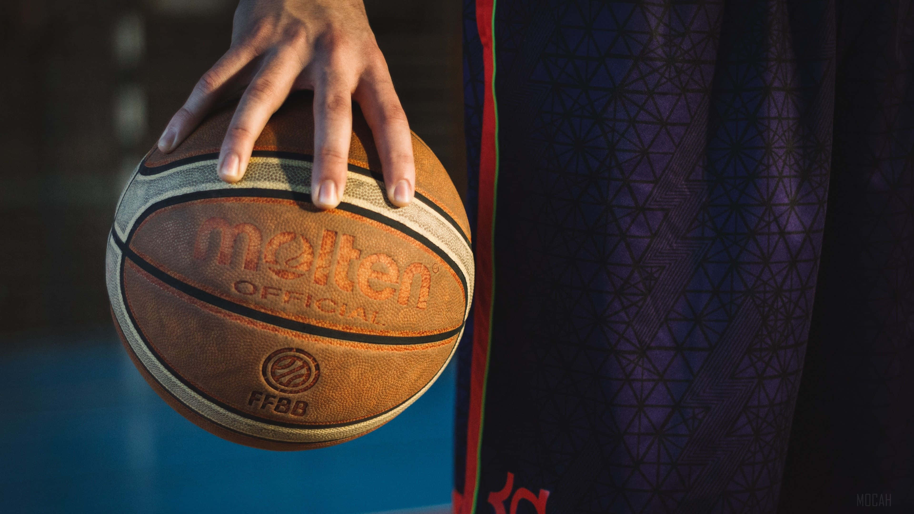 Oorheers die Baan met 4K Basketbal Muurpapier