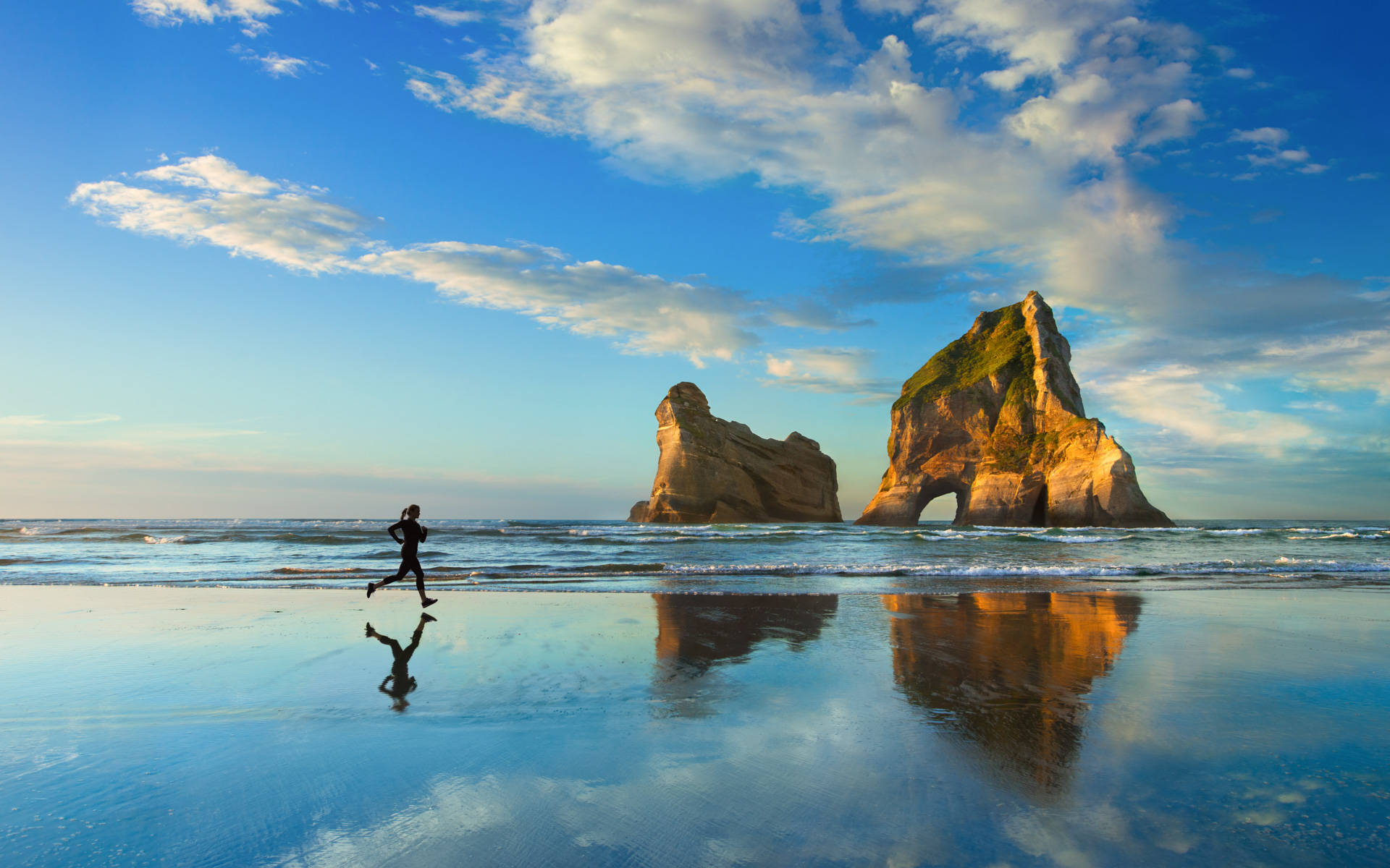 Oorspronklike Windows Jog by die Strand Muurpapier