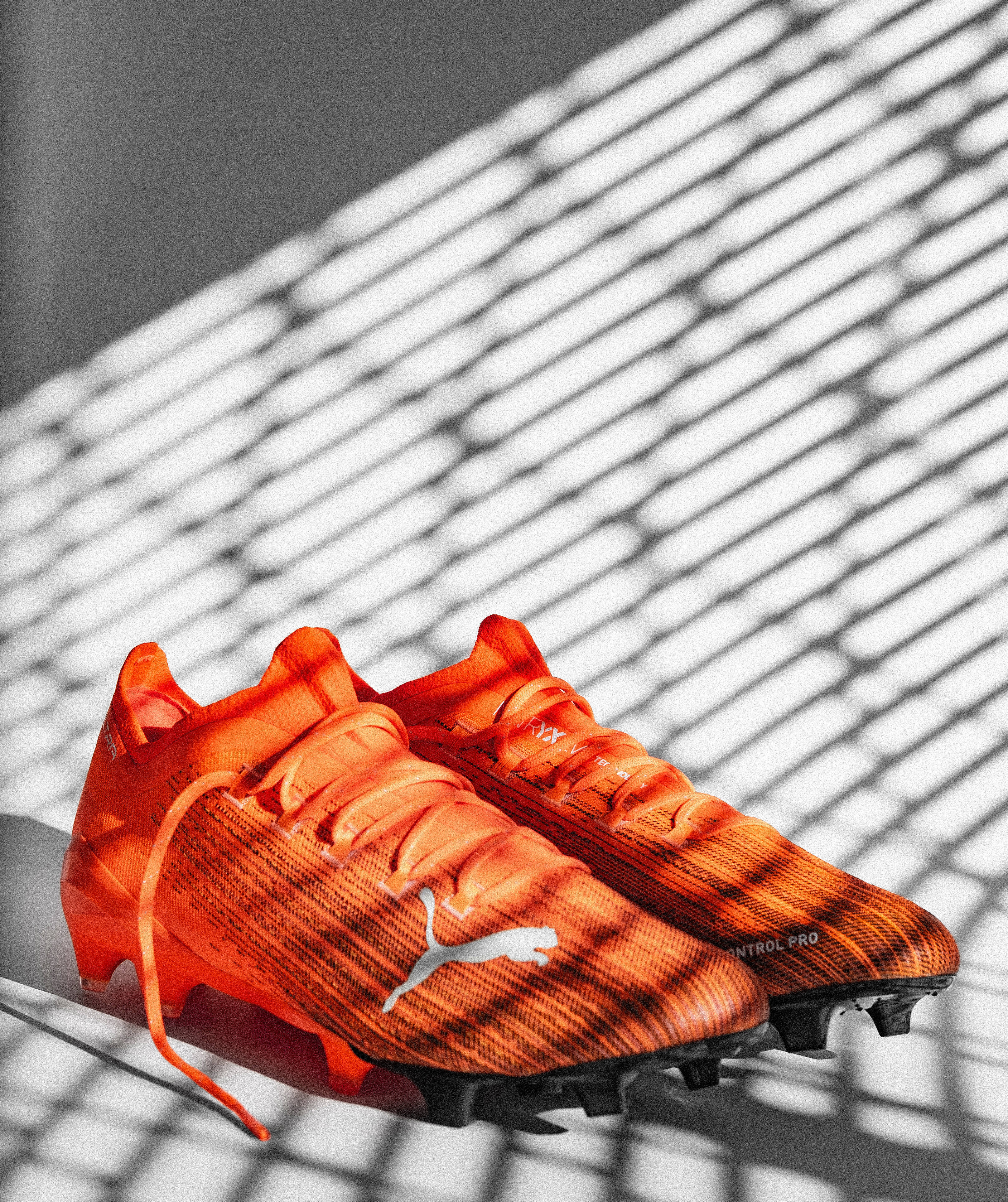 Oranje Puma Ultra 1.1 Muurpapier